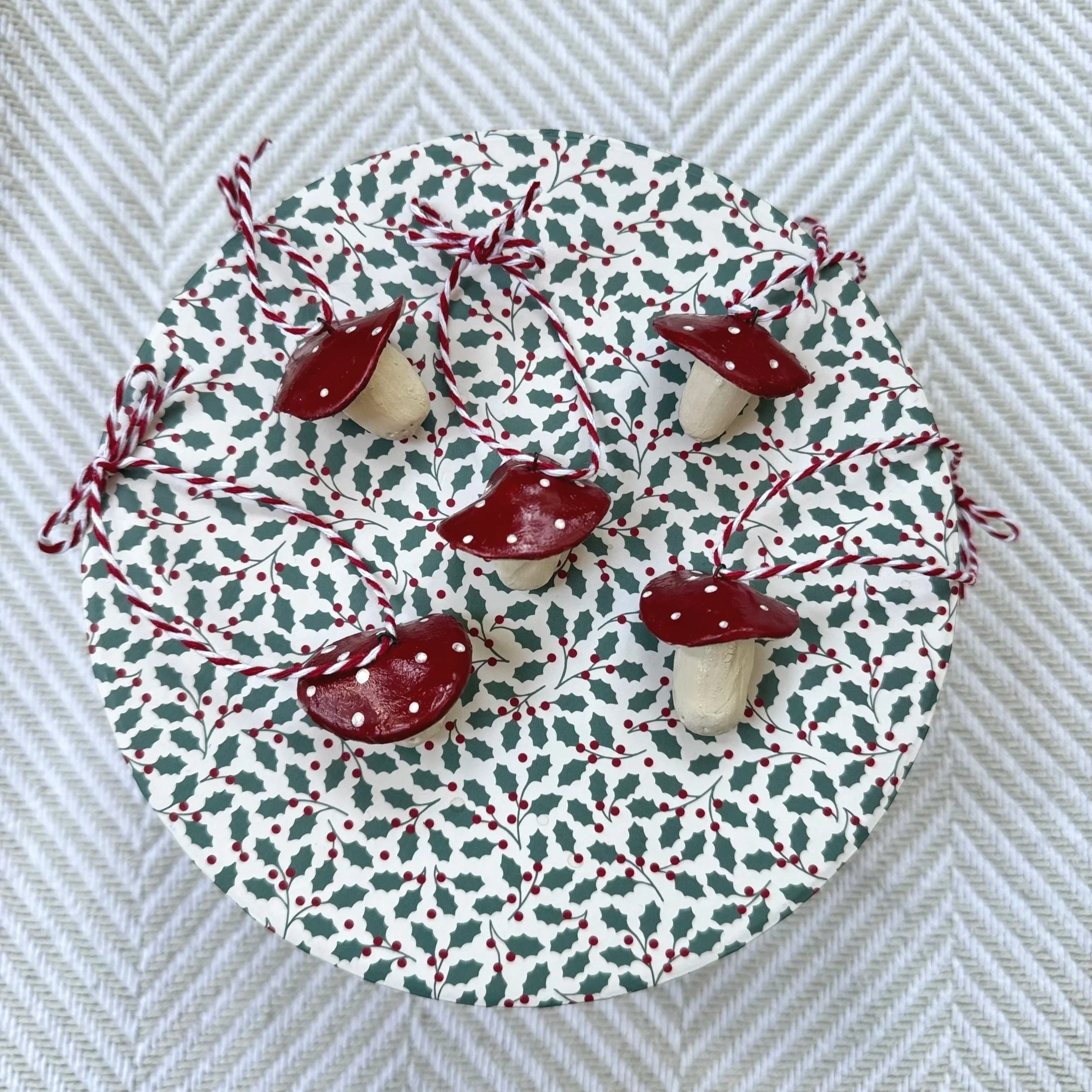 hand sculpted and painted red and white mushroom Christmas ornament