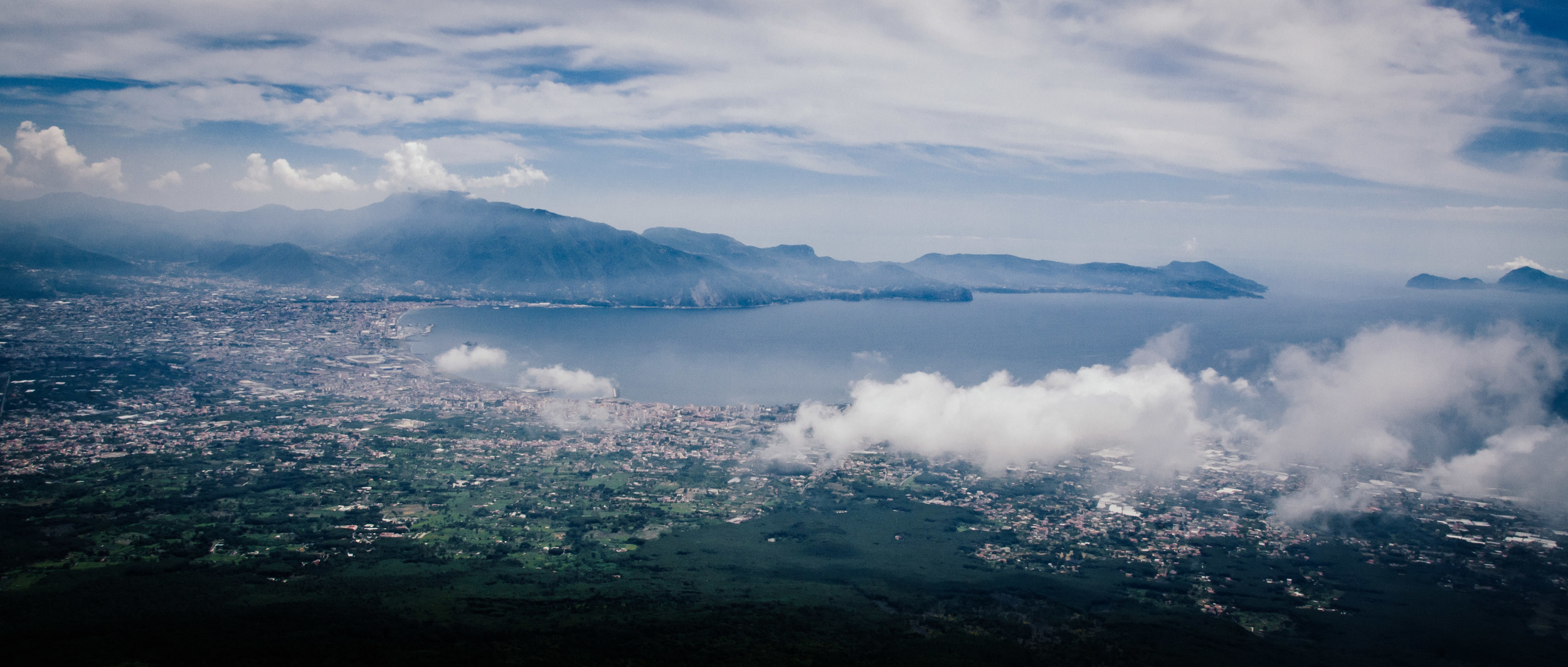 Above the clouds on the shoulders of a dangerous giant