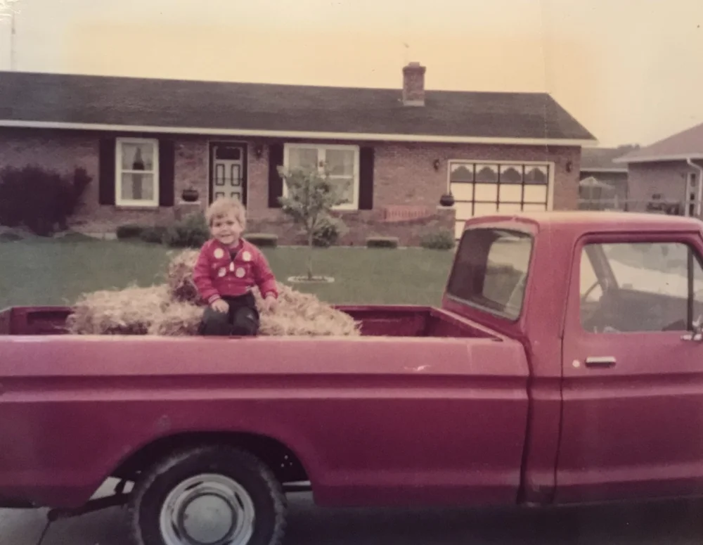Little AJ in the truck that "murdered" Buddy #1.