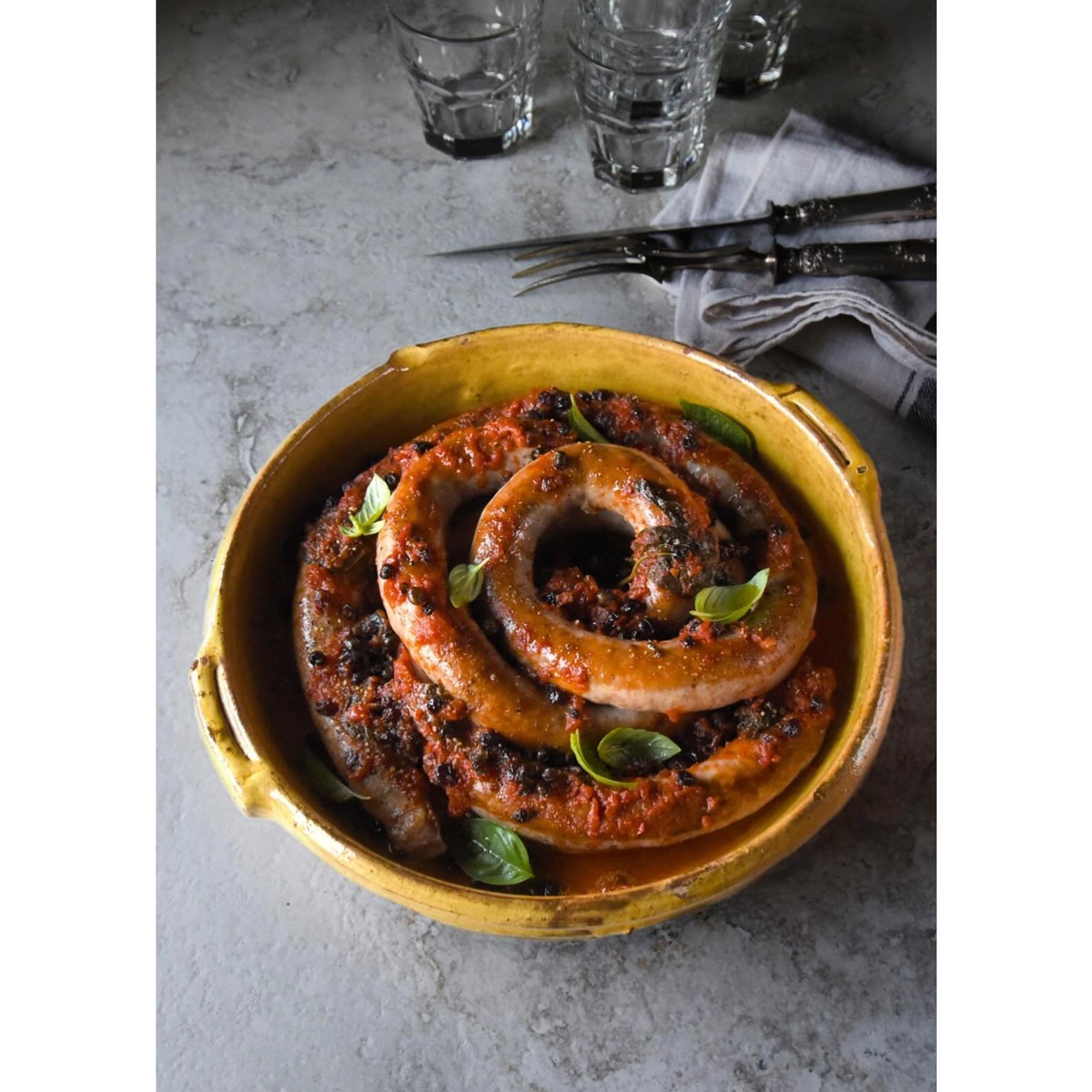 Becoming a family favourite, @salumiaustralia 
coiled pork and fennel sausage cooked in a tomato, currant, basil and fried caper sauce. 
Gorgeous served with polenta and a mixture of gently saut&eacute;ed greens with a good hit of chilli and anchovie