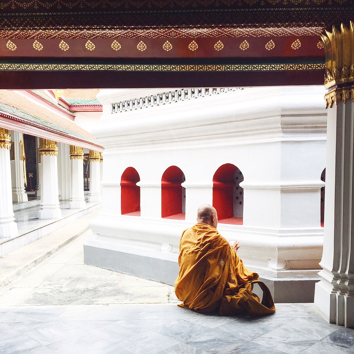  A monk resting at Wat Phra Kaew 