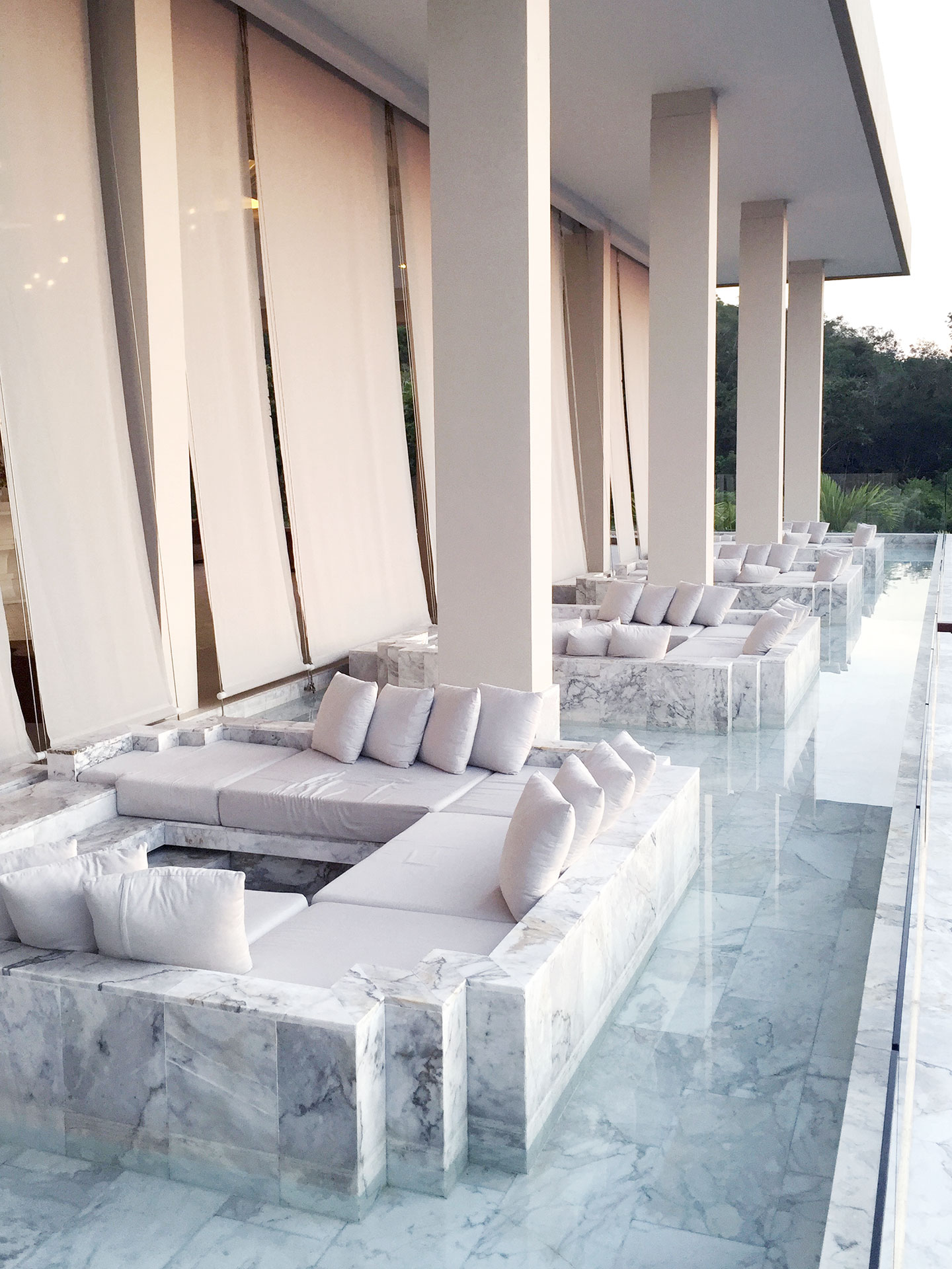 The lounge area at Avista Hideaway Phuket Patong by Sofitel. 