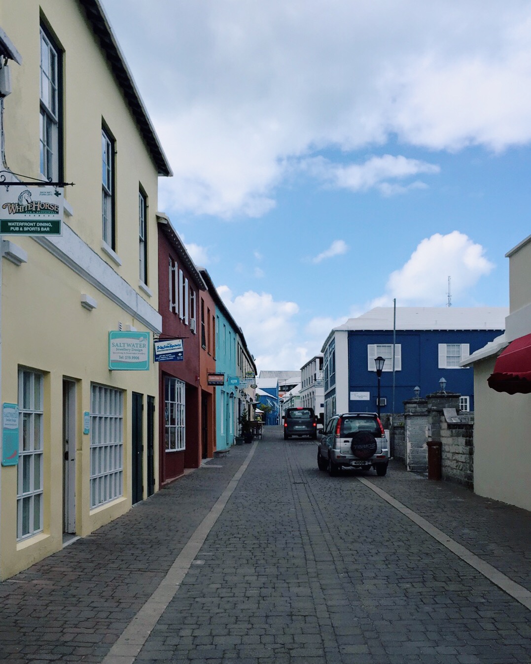  An alleyway of pastel buildings in Historic Old Town St. George. 