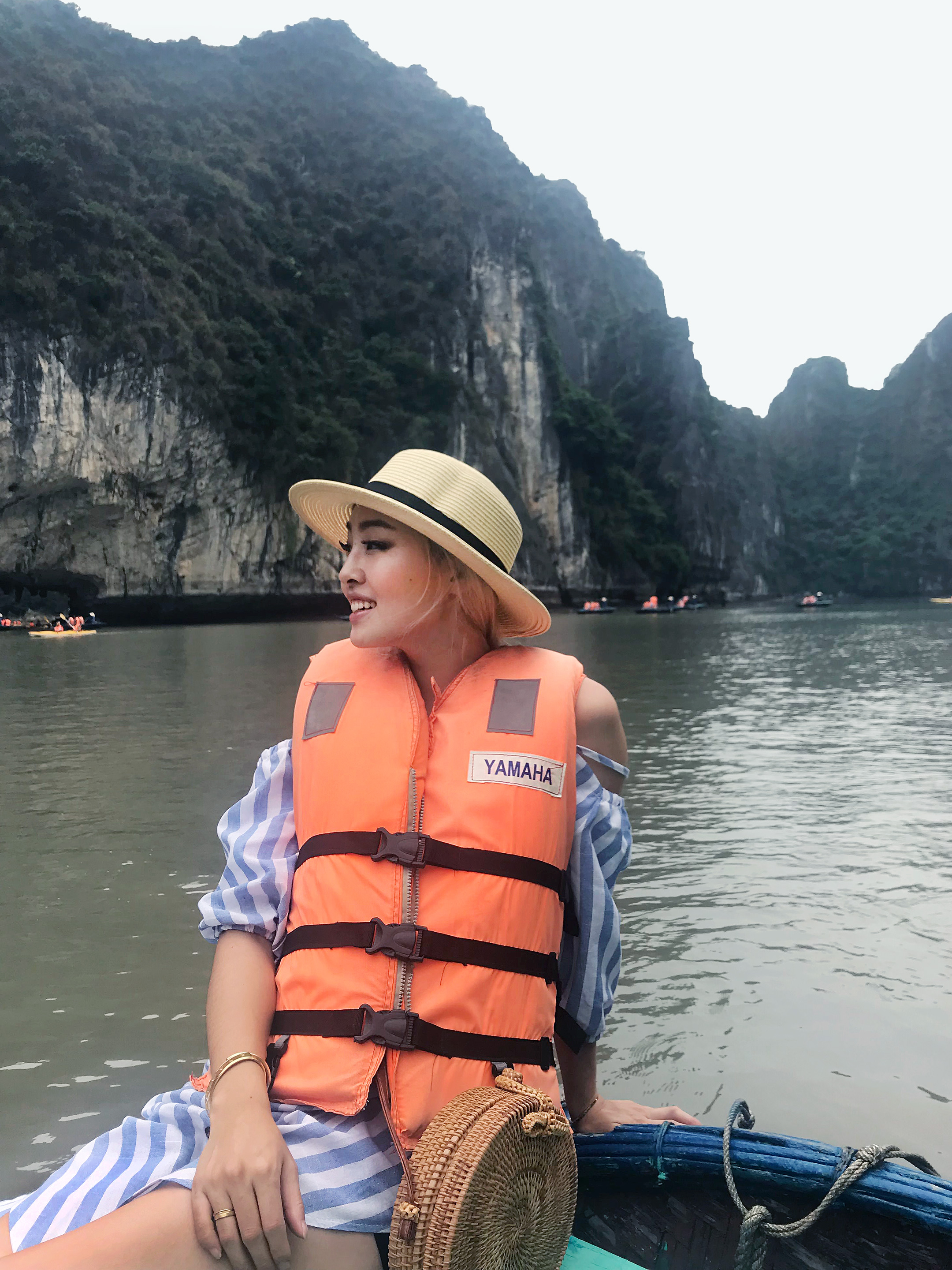 ENJOYING THE BOAT RIDE THROUGH THE GROTTOES