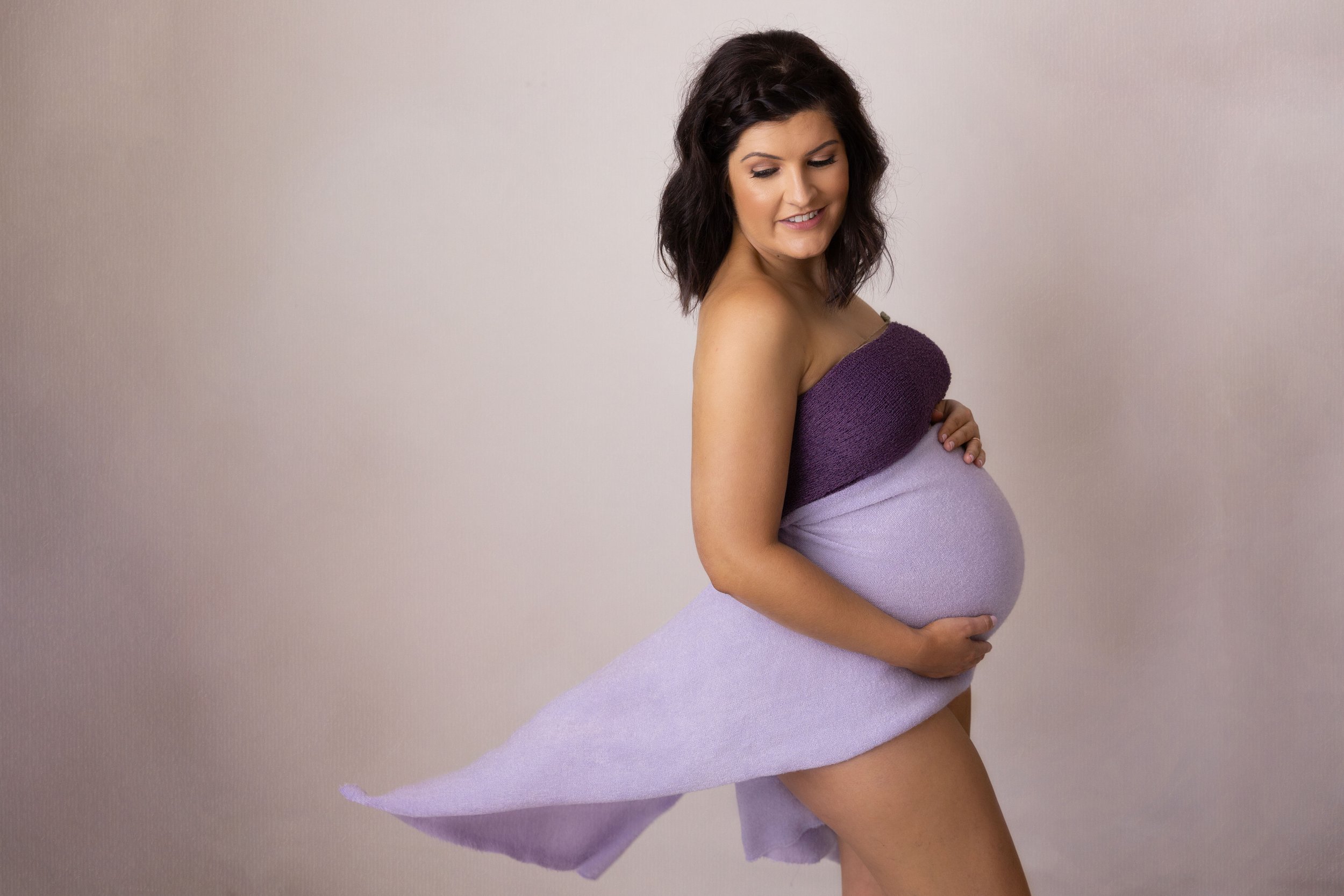 Gold Coast maternity pregnancy photography Jade Read purple styling in studio 