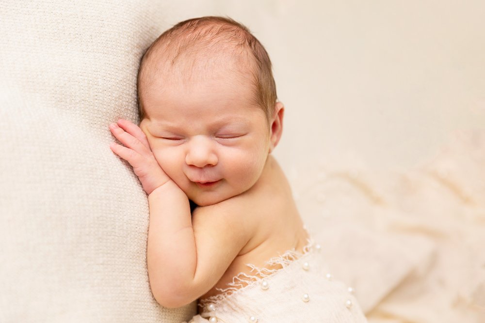 gold coast newborn baby photographer jade read smiling baby