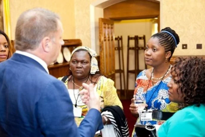 Jeanne Muliri Kabekatyo and Modestine Etoy (l-r, facing camera) as experts in London at The Global Summit to End Sexual Violence in Conflict, June 2014. 