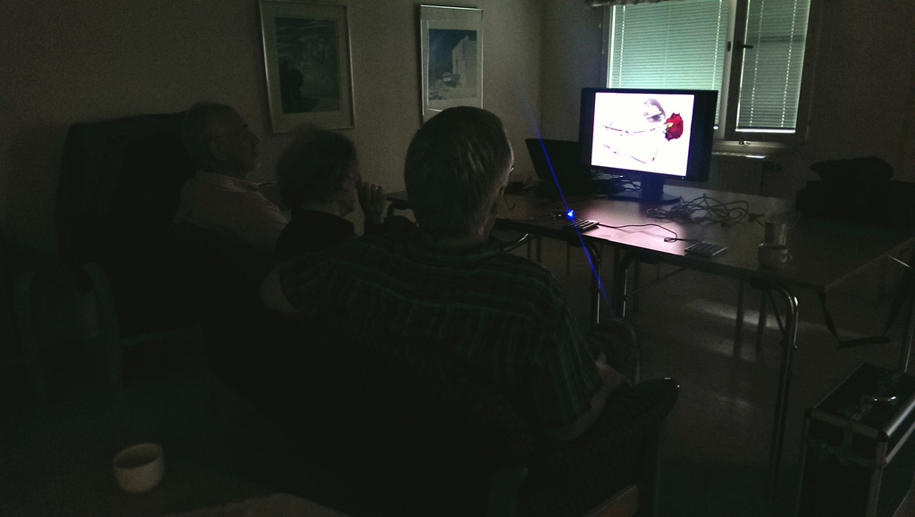 The jury for the color section looking at entries, trying to decide what images deserve to be accepted.