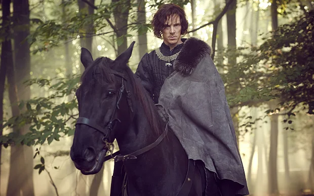 BBC Two have released the first picture of the Bafta-nominated actor as Richard III for upcoming drama The Hollow Crown: The Wars of the Roses....... Whoa.. hold the reigns. The first picture of Benedict Cumberbatch as Richard III has been released. Sitting coyly on a black horse, a black horse, the 38-year-old Sherlock actor will star as the English king in BBC's The Hollow Crown: The Wars of the Roses, an adaptation of four of Shakespeare's historical plays. The series will comprise Henry VI Parts I, II and III, and conclude with Richard III. All four films of The Hollow Crown: The Wars of the Roses will be directed by Dominic Cooke (former artistic director of the Royal Court) and features a range of big-name British talent including Hugh Bonneville, Judi Dench and Keeley Hawes. Sadly, fans have a long wait as the series is unlikely to air until 2016.