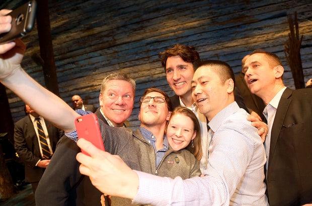 Canadian Prime Minister Justin Trudeau poses for a selfie with the crew backstage at the hit musical 'Come From Away' on Broadway at the Schoenfeld Theatre on March 15, 2017, in New York City. CREDIT - Bruce Glikas/Getty Images