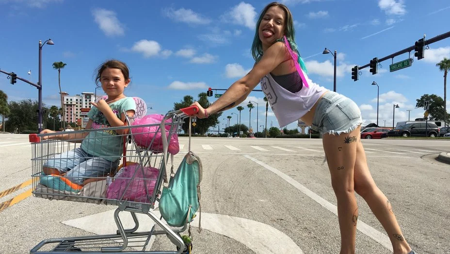 Actress Bria Vinaite plays 20-something single mom Halley in The Florida Project . Her daughter, Moonee, is played by Brooklynn Prince. Marc Schmidt/Courtesy of A24
