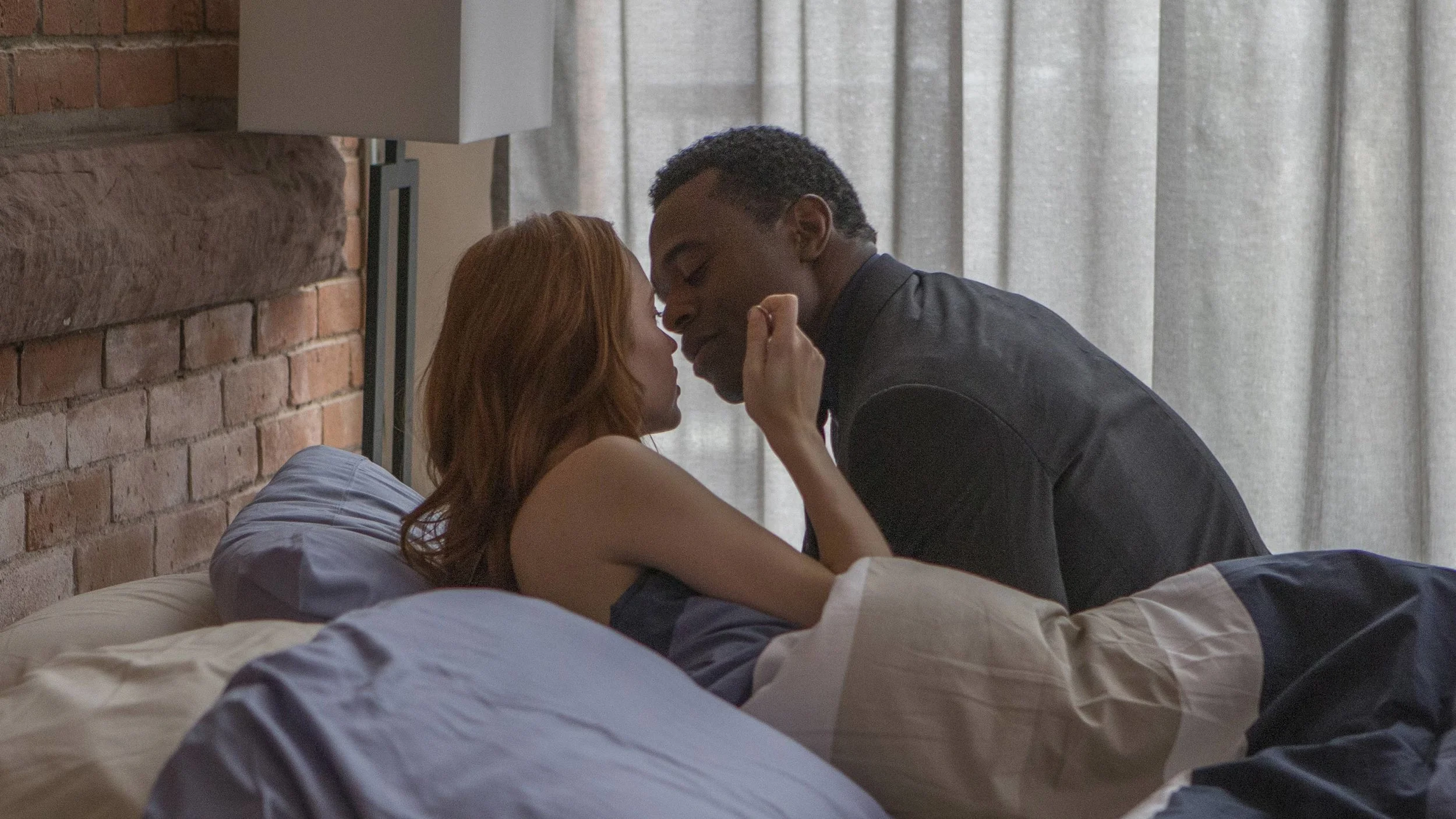 Elyse Levesque & Lyriq Bent in, Shoot The Messenger