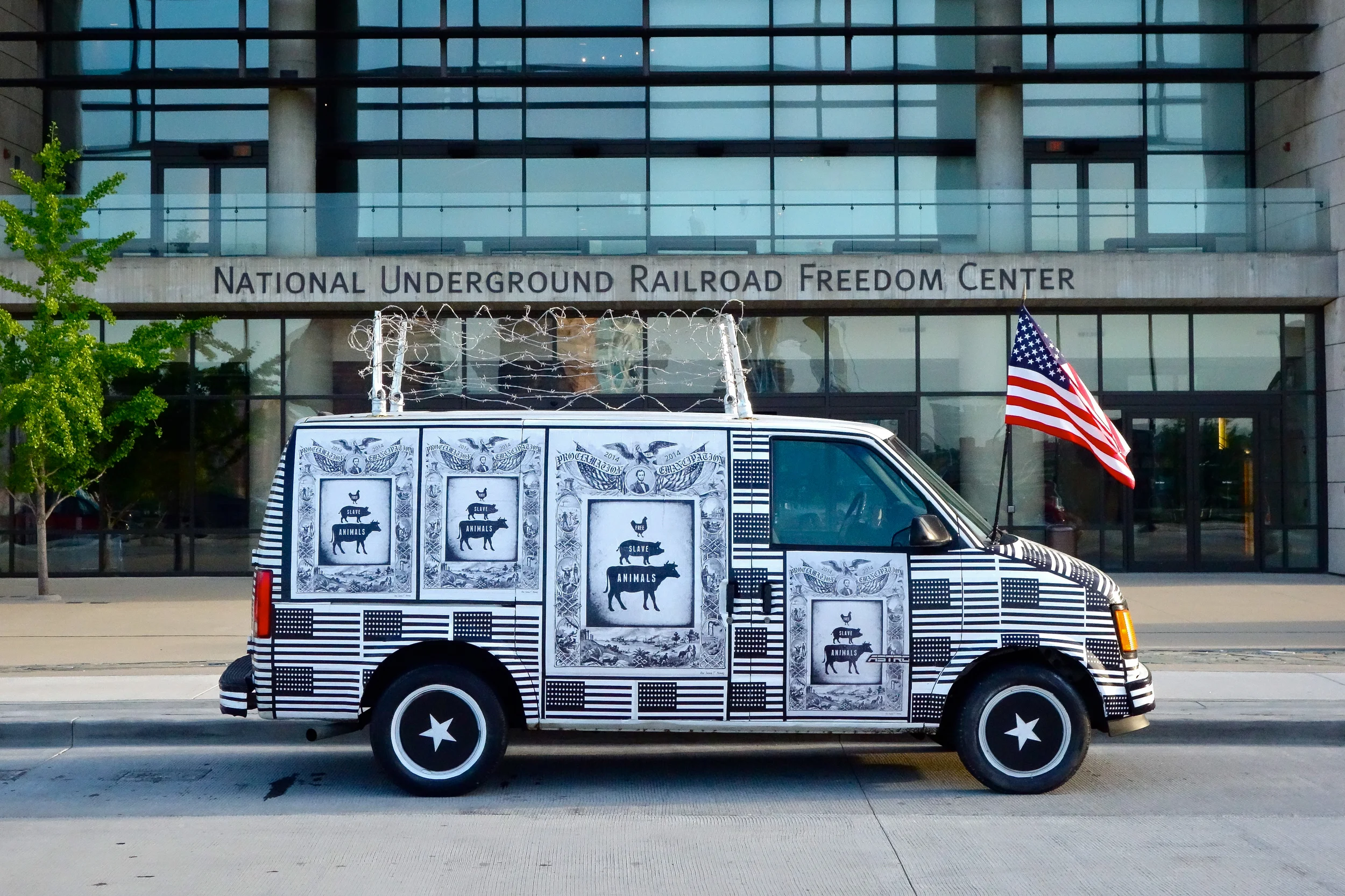 THE INTERNATIONAL FREEDOM CENTER DELIVERING THE EMANCIPATION PROCLAMATION FOR ALL SLAVE ANIMALS IN FRONT OF THE NATIONAL UNDERGROUND RAILROAD FREEDOM CENTER, CINCINNATI, OHIO JUNE 19, 2014
