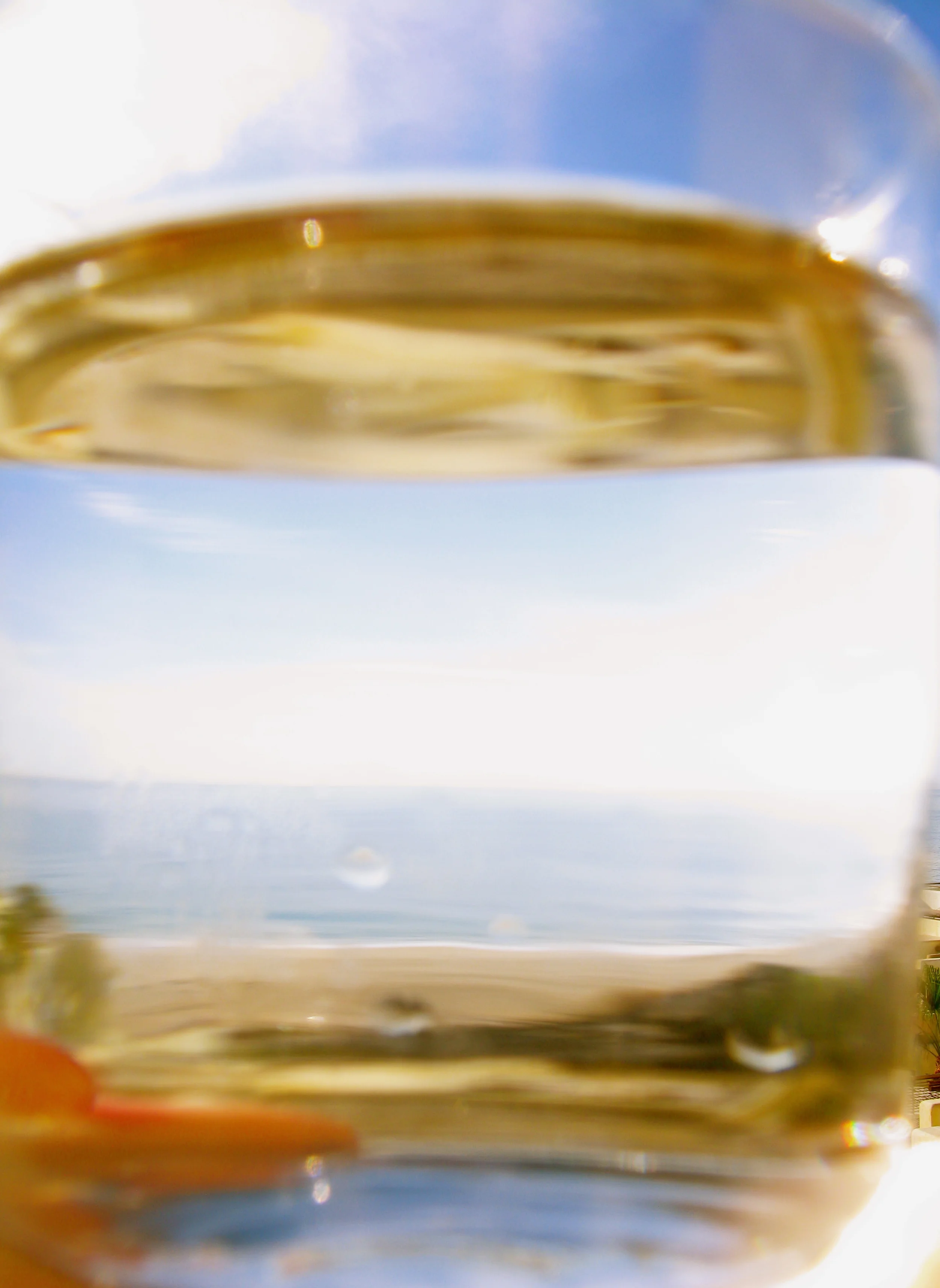 OCEAN VIEW THROUGH A GLASS OF CLEAN WATER, ISLA MUJERES, MEXICO