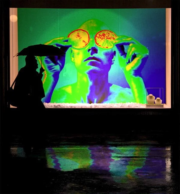 NEW EARTH VISION WITH ORANGE-SLICED SUNGLASSES