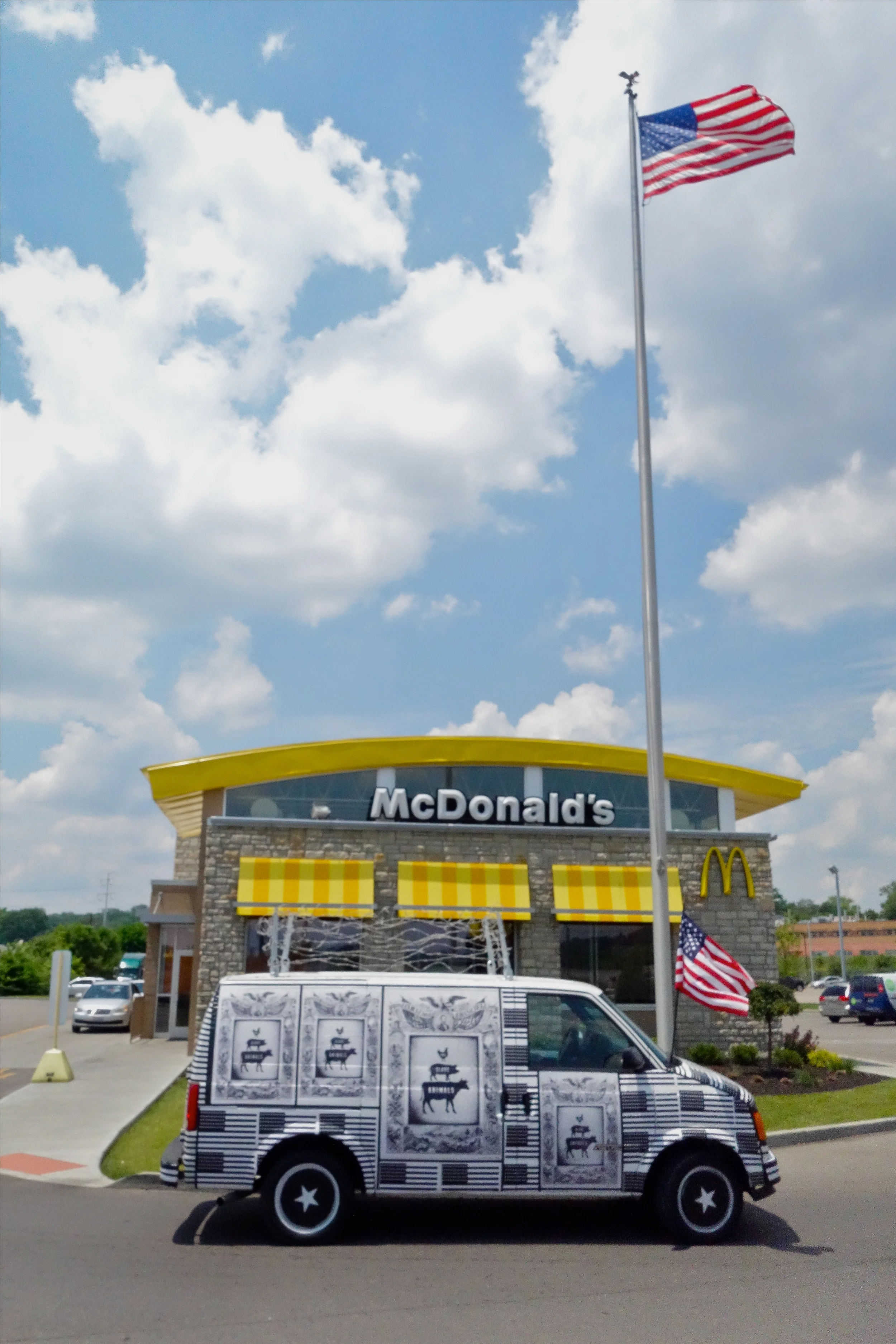 THE INTERNATIONAL FREEDOM CENTER DECLARING FREEDOM TO ALL SLAVE ANIMALS IN FRONT OF A MCDONALD'S RESTAURANT