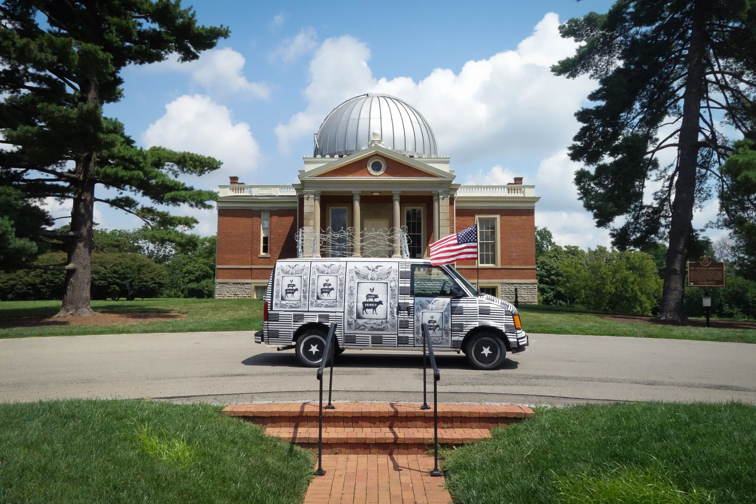 THE INTERNATIONAL FREEDOM CENTER OVERTLY APPEARING IN THE EYE OF THE CINCINNATI OBSERVATORY