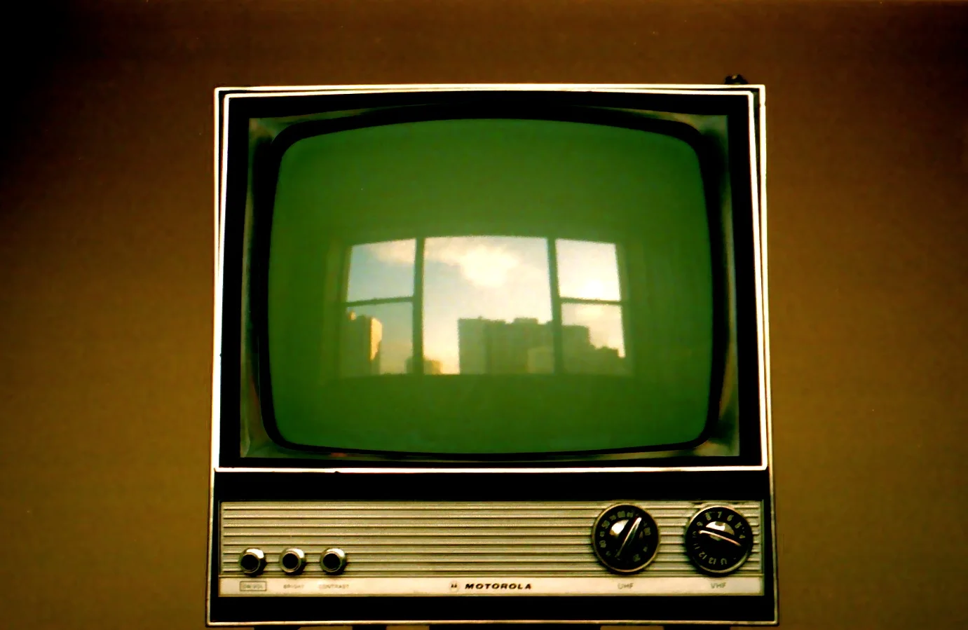 WATCHING THE SUN RISE ON A BROKEN BLACK AND WHITE TELEVISION, CHICAGO, ILLINOIS