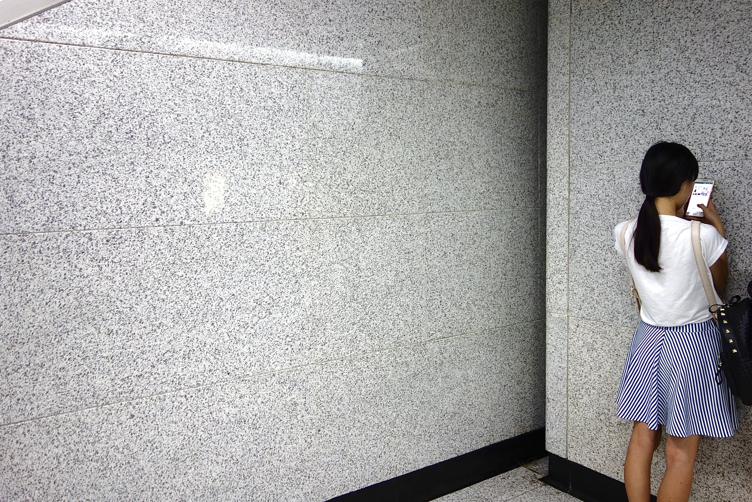 EXAMINING THE DUST ON THE WALL