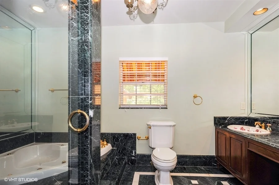 16_8820ArvidaDr_13_MasterBathroom_LowRes.jpg
