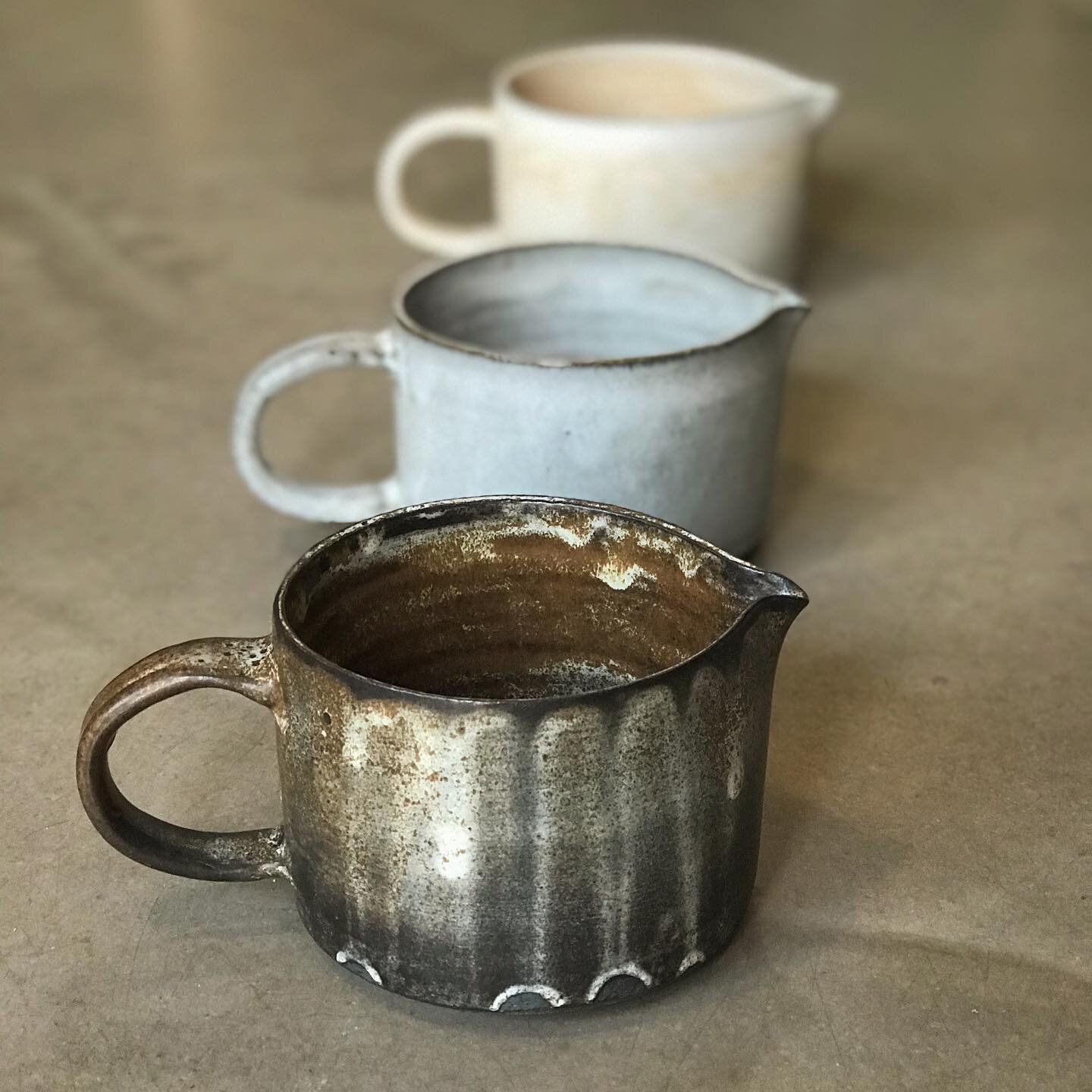 .
My first pitchers for bearnaise or any other favourite sauce or dressing or .. soda!
.
I posted the front one a couple of days ago, freshly glazed before firing. There you might notice little red marks, at the bottom of the pitcher - where my finge