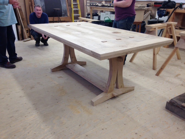The final fit before polishing, the workshop gathers to inspect! 
