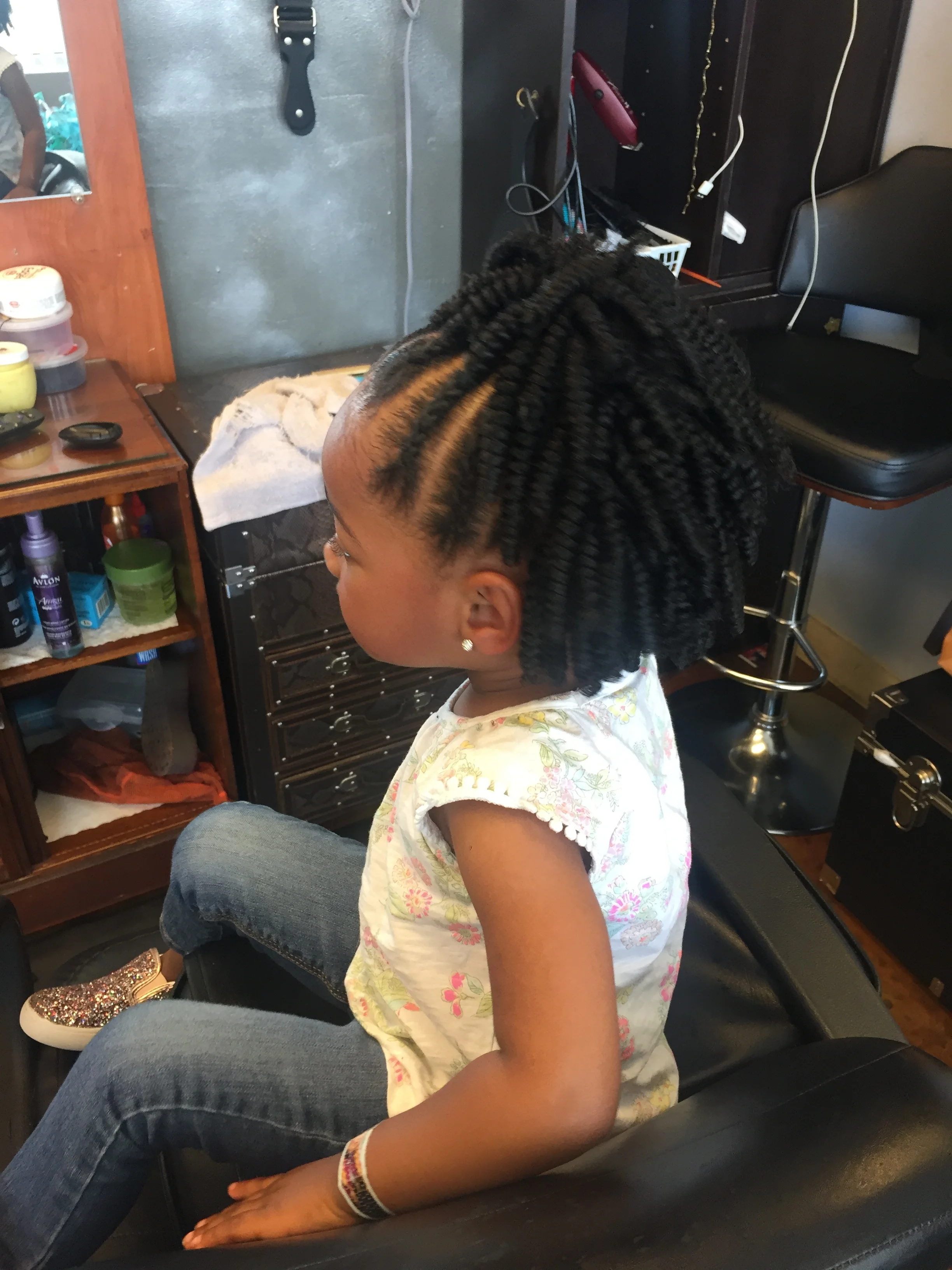  Protective style crochet braids on child (side view) 