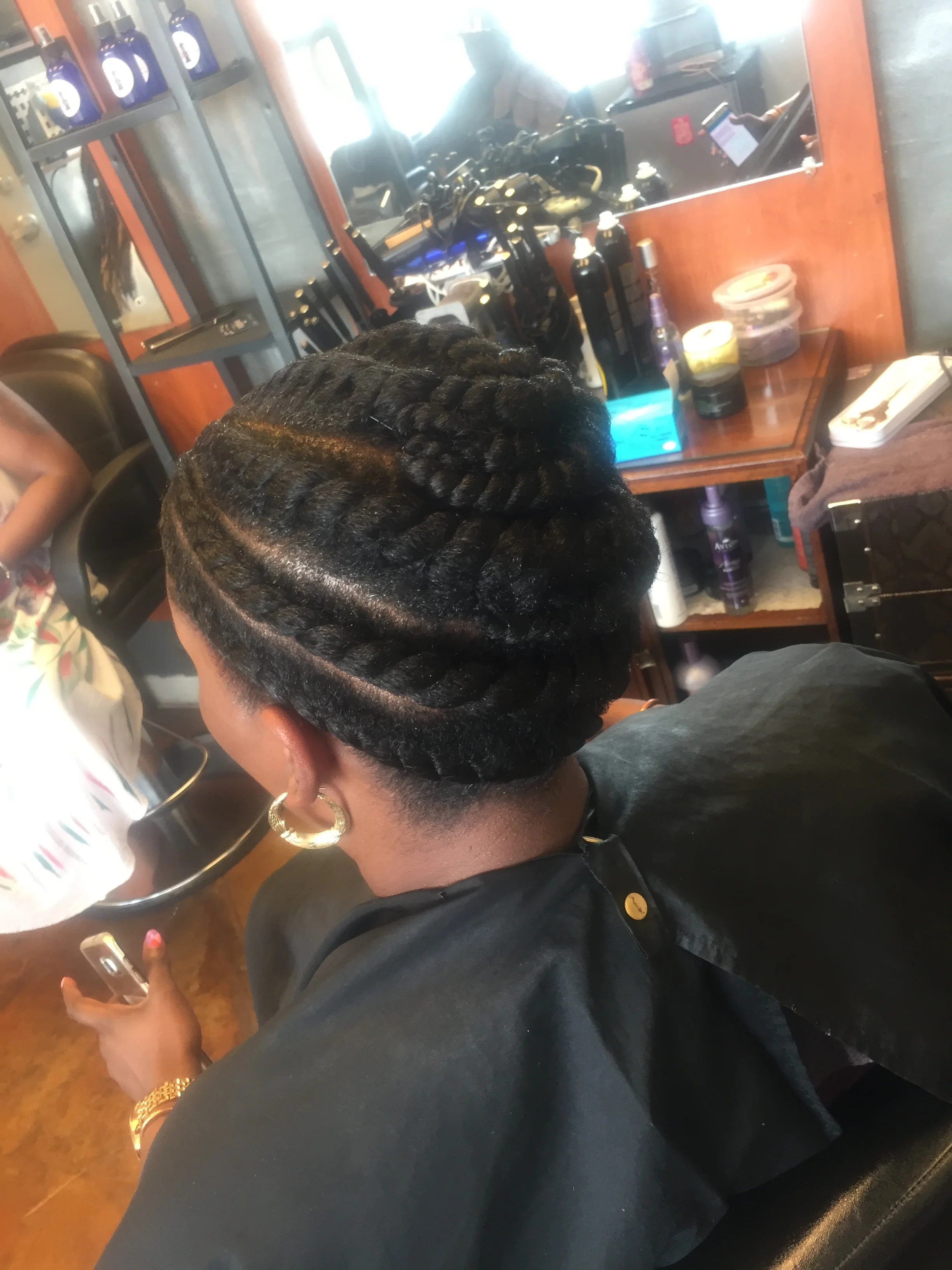  Flat twists protective style on natural hair (side view) 
