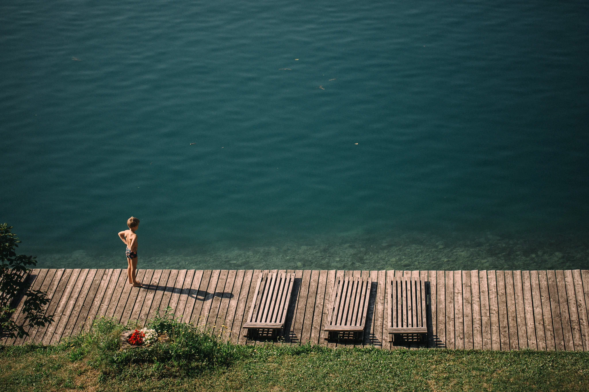 30.07.2019 Boy on the edge of Lake Bled.