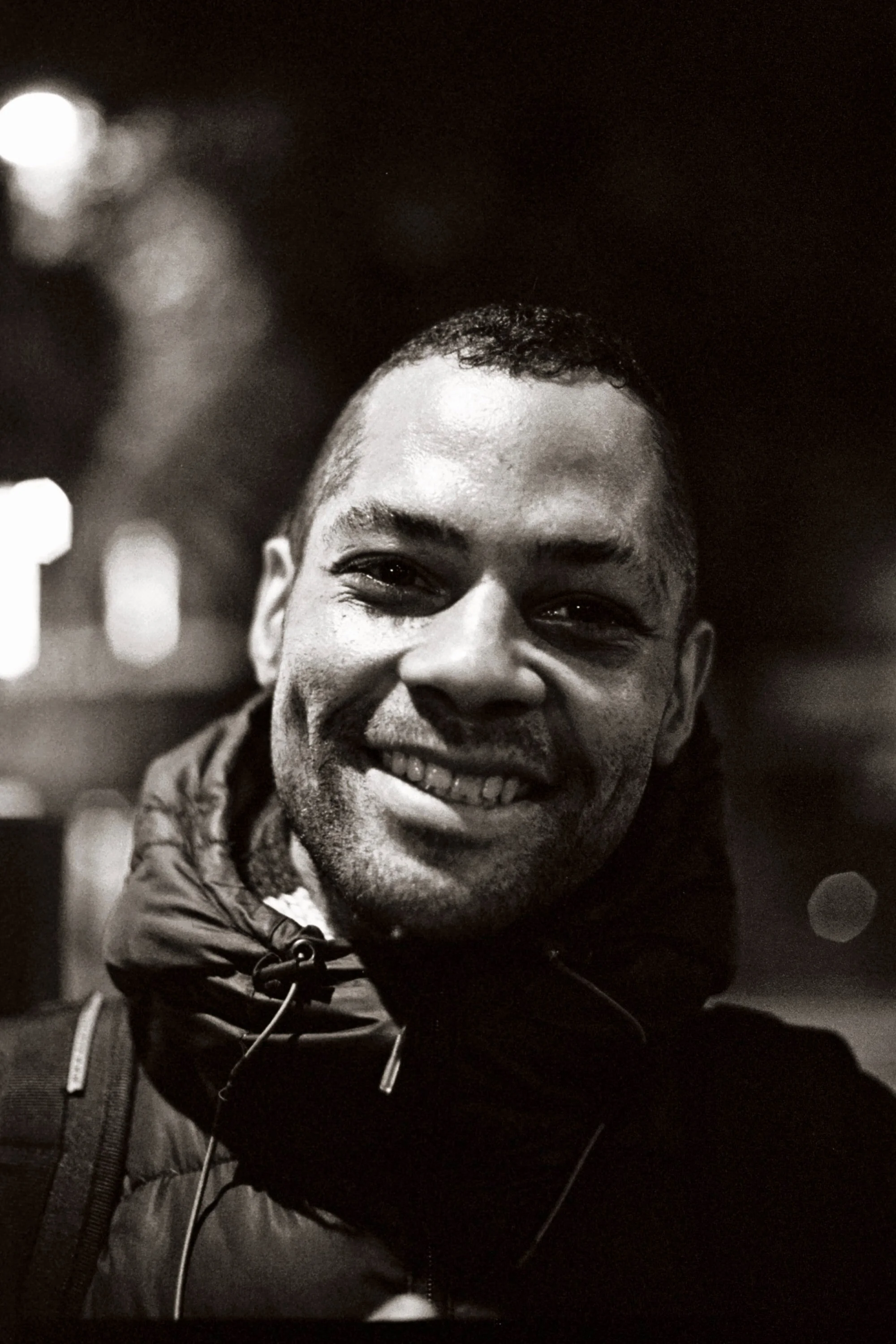 While walking home late from a restaurant, I heard a voice break the silence asking what sort of stuff I was shooting. I turned to see this guy here, walking with his backpack and a yoga mat rolled up in the side. Walking in the same direction, we chatted a bit about photography and the city of Paris. I asked him if he was a yoga practitioner, to which he responded that the mat was actually his bed, as he was homeless at the time. He posed for this portrait, and said that he was off to find a place for lodging for the night. Unfortunately I forget his name.