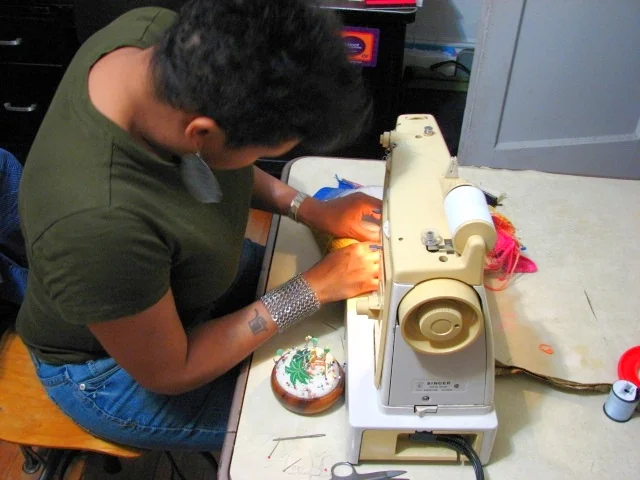 My assistant on the project Nicole Byrd, carefully constructing the sample.