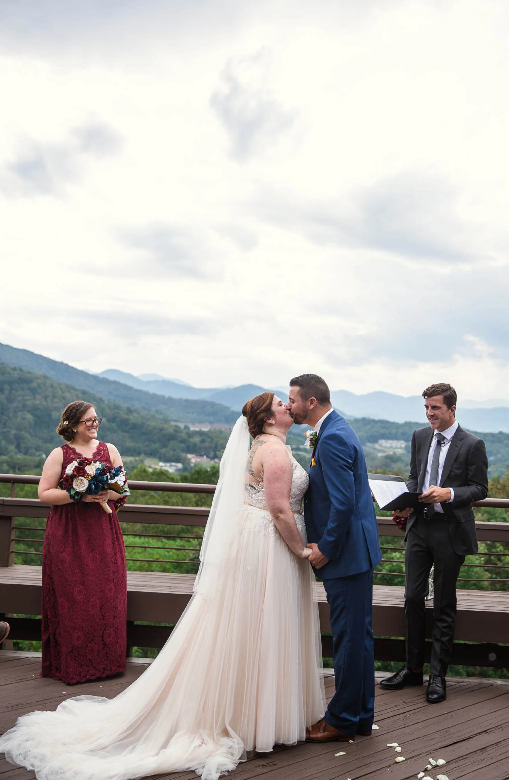 First Kiss overlooking the Blue Ridge Mounatins - Meredith + Jason - The Crest Center and Pavilion in Asheville, NC - Raleigh Wedding Photographer