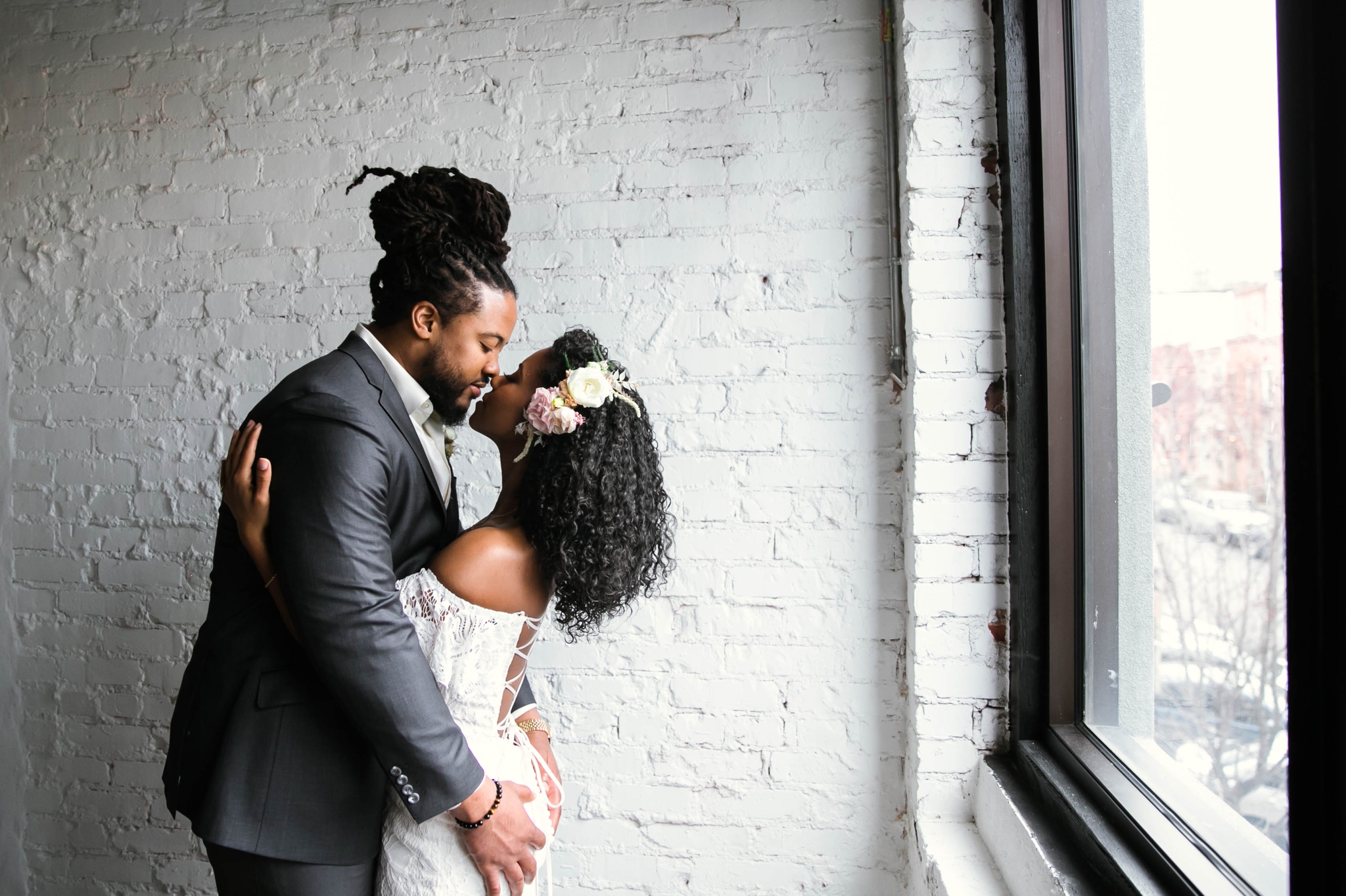 Indoor Wedding Portrait with natural light by a Window of an African American Black couple - boho tropical wedding inspiration by Honolulu, Oahu, Hawaii  Photographer