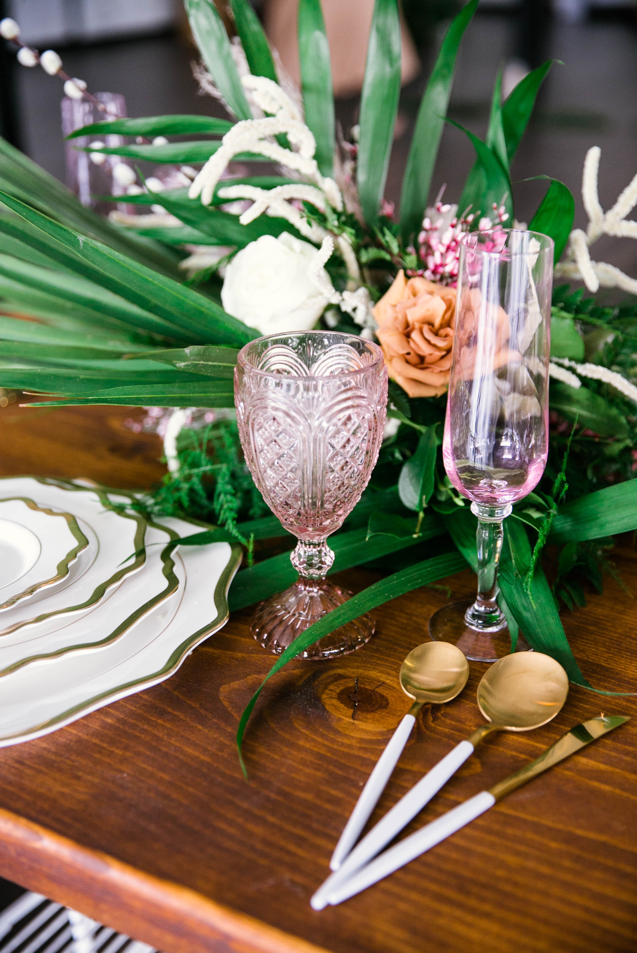 Wedding Table Setting with white and gold plates, pink glass wear, gold and white silverware - Tropical Destination Wedding Inspiration - Honolulu, Oahu, Hawaii Photographer