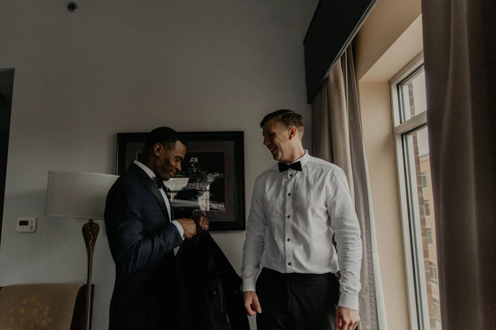 Best Man helping Groom getting ready in a Hampton Inn and Suites - Matt Smarsh and Johanna Dye - Raleigh North Carolina Urban Edgy Downtown Wedding