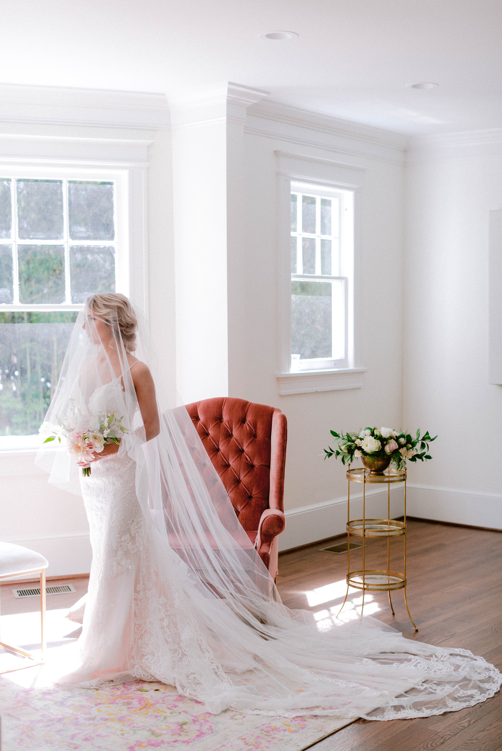  Indoor Natural Light Bridal Portraits by a window with a white backdrop - classic bride with soft drop veil over her face - wedding gown by Stella York - Honolulu, Oahu, Hawaii Wedding Photographer 