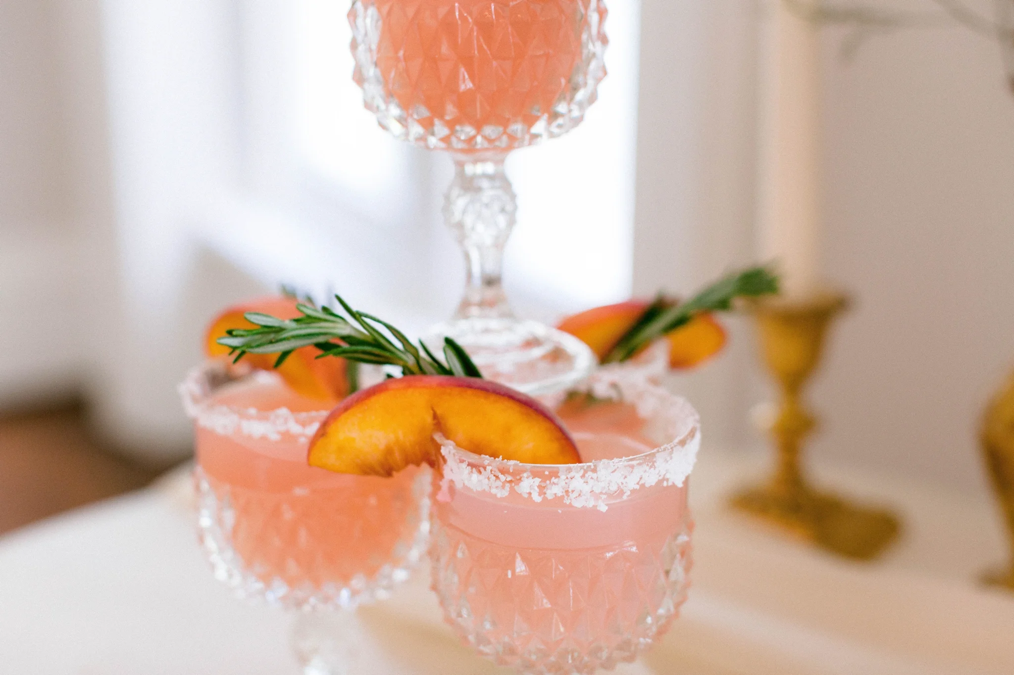 pink and salmon colored custom wedding day cocktails with peaches - luxury estate wedding - honolulu oahu hawaii wedding photographer - johanna dye photography