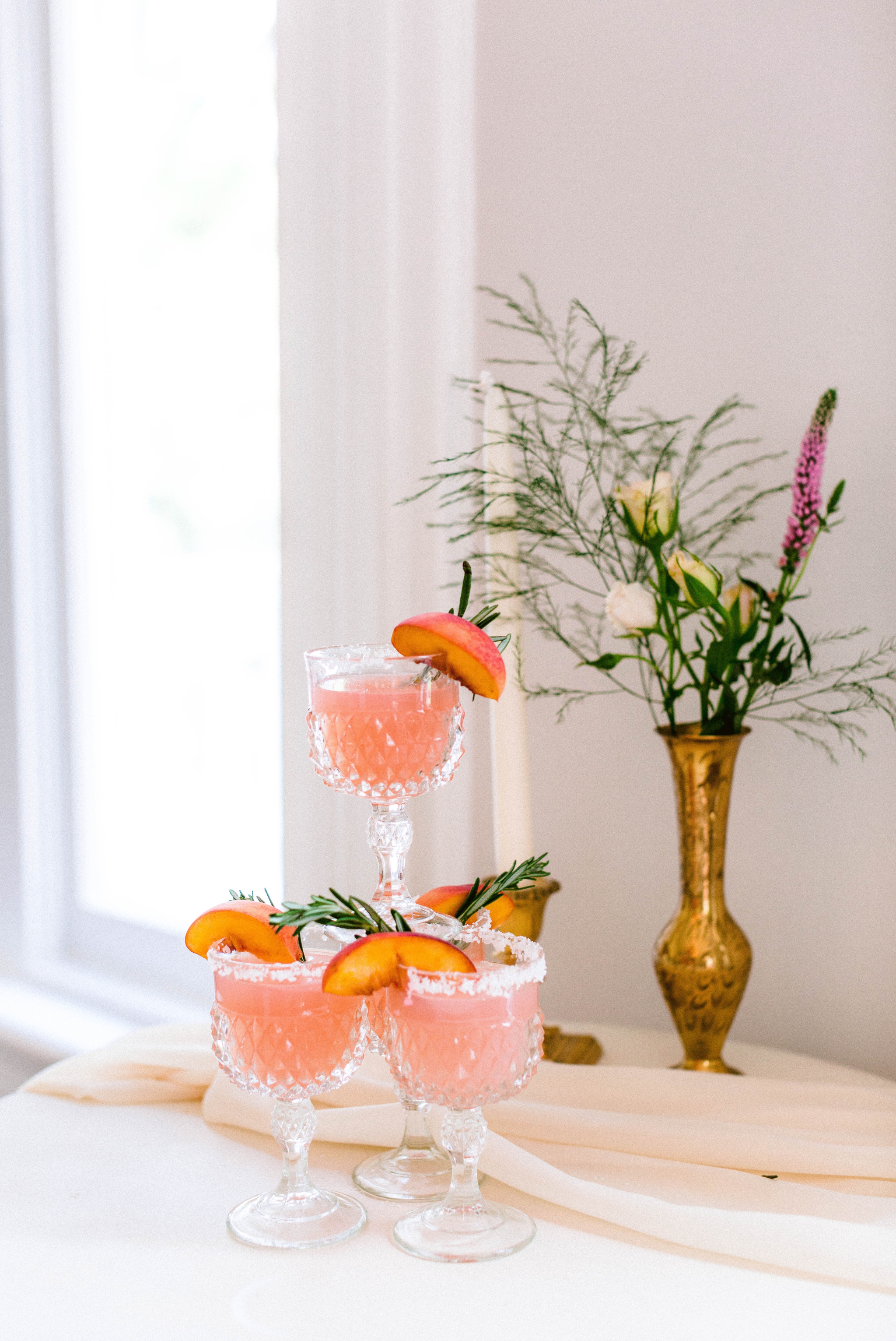  pink and salmon colored custom wedding day cocktails with peaches - luxury estate wedding - honolulu oahu hawaii wedding photographer - johanna dye photography 