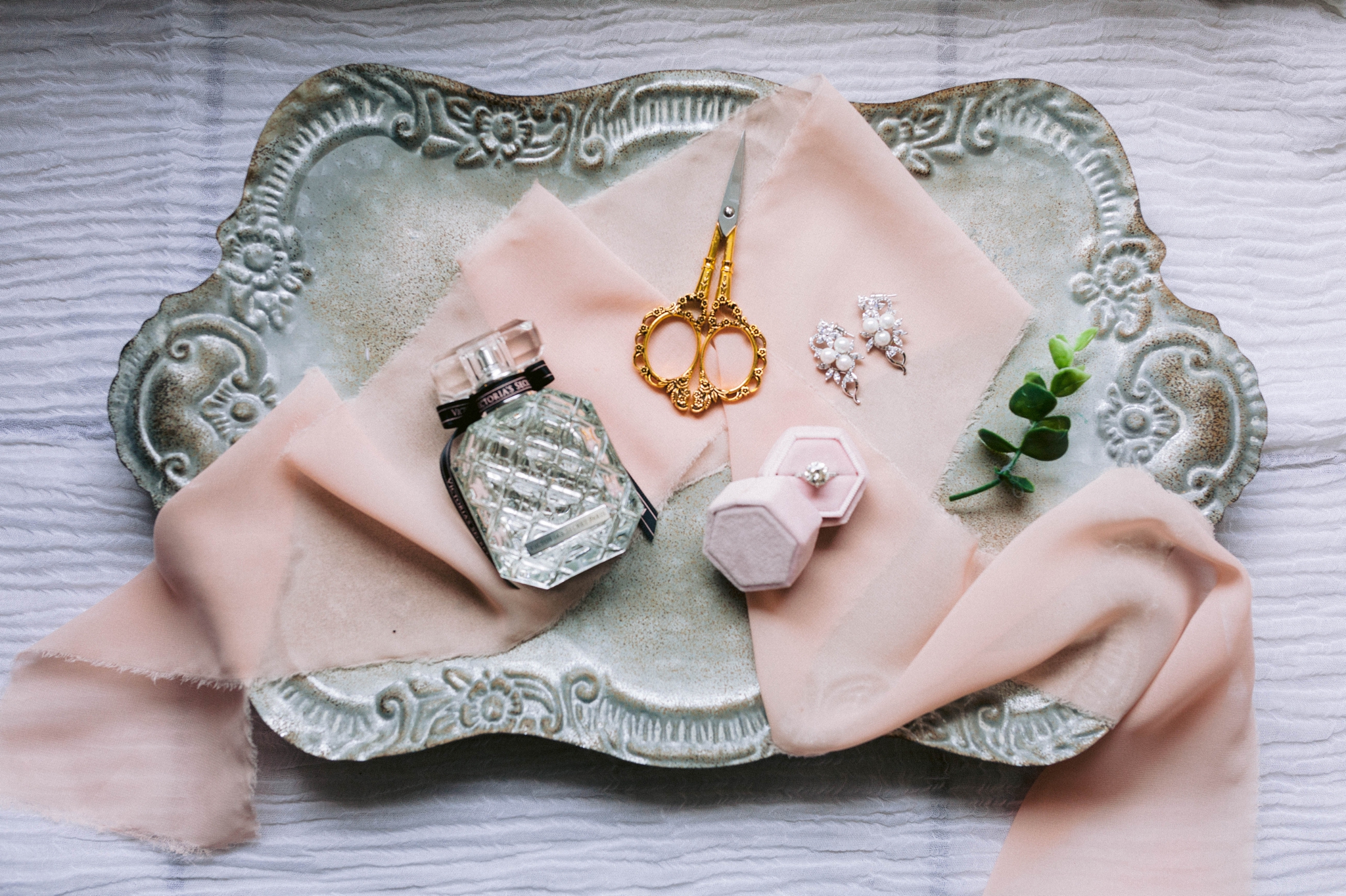  wedding details lay flat with a velvet ring box with engagement ring, golden scissors and a victorias secret perfume - Honolulu Oahu Hawaii Wedding Photographer   