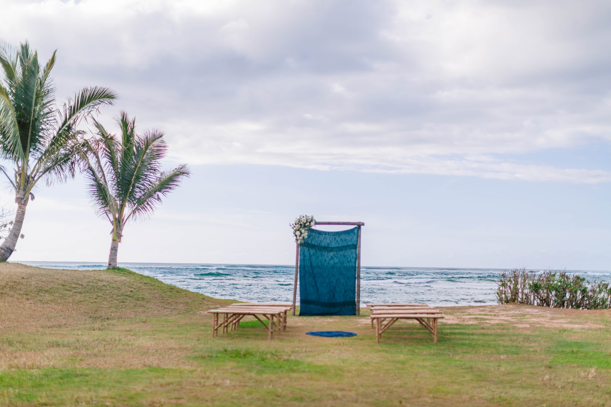 Ceremony Arch with Fabric in front of the ocean - Ana + Elijah - Wedding at Loulu Palm in Haleiwa, HI - Oahu Hawaii Wedding Photographer 