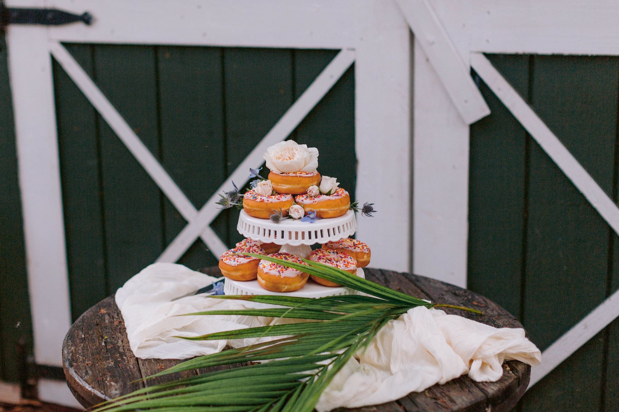 Donuts as the wedding cake - Ana + Elijah - Wedding at Loulu Palm in Haleiwa, HI - Oahu Hawaii Wedding Photographer - #hawaiiweddingphotographer #oahuweddings #hawaiiweddings