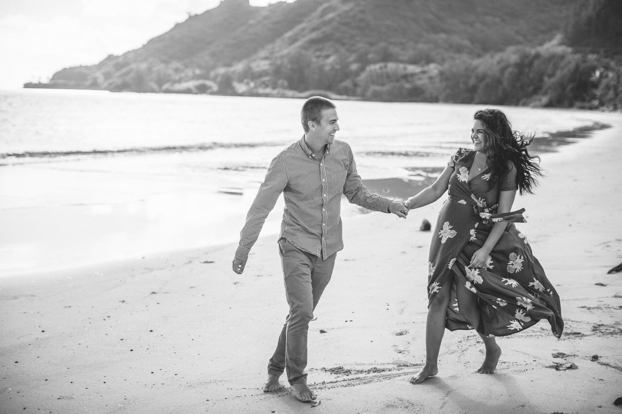 Couple Walking on the beach - Rilee + Max - Beach Engagement Session at Kahana Bay in Kaaawa, HI - Oahu Hawaii Wedding Photographer