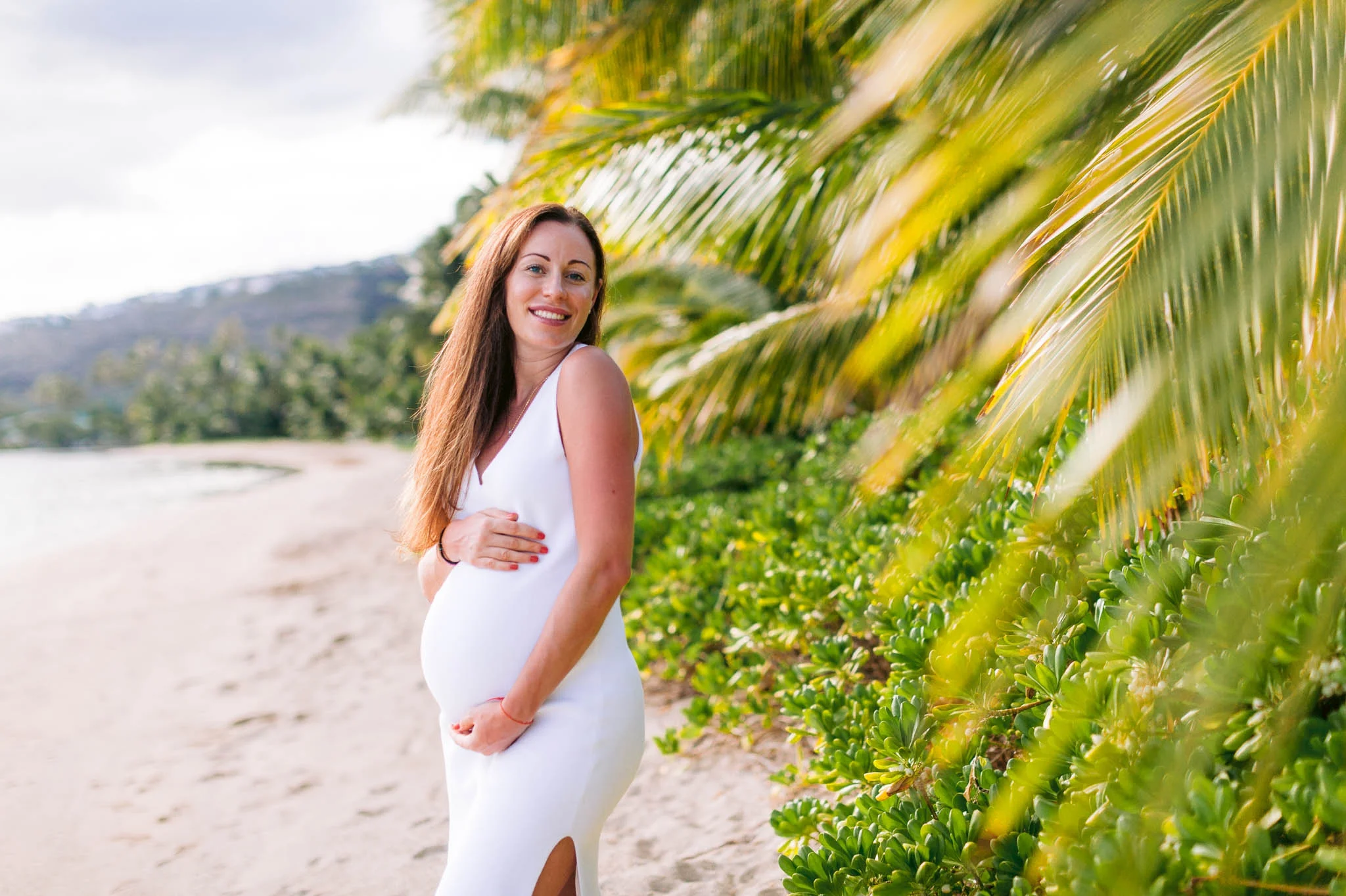 White sandy Beach Maternity Photography Session with Palm Trees - Hawaii Kai Family Photographer