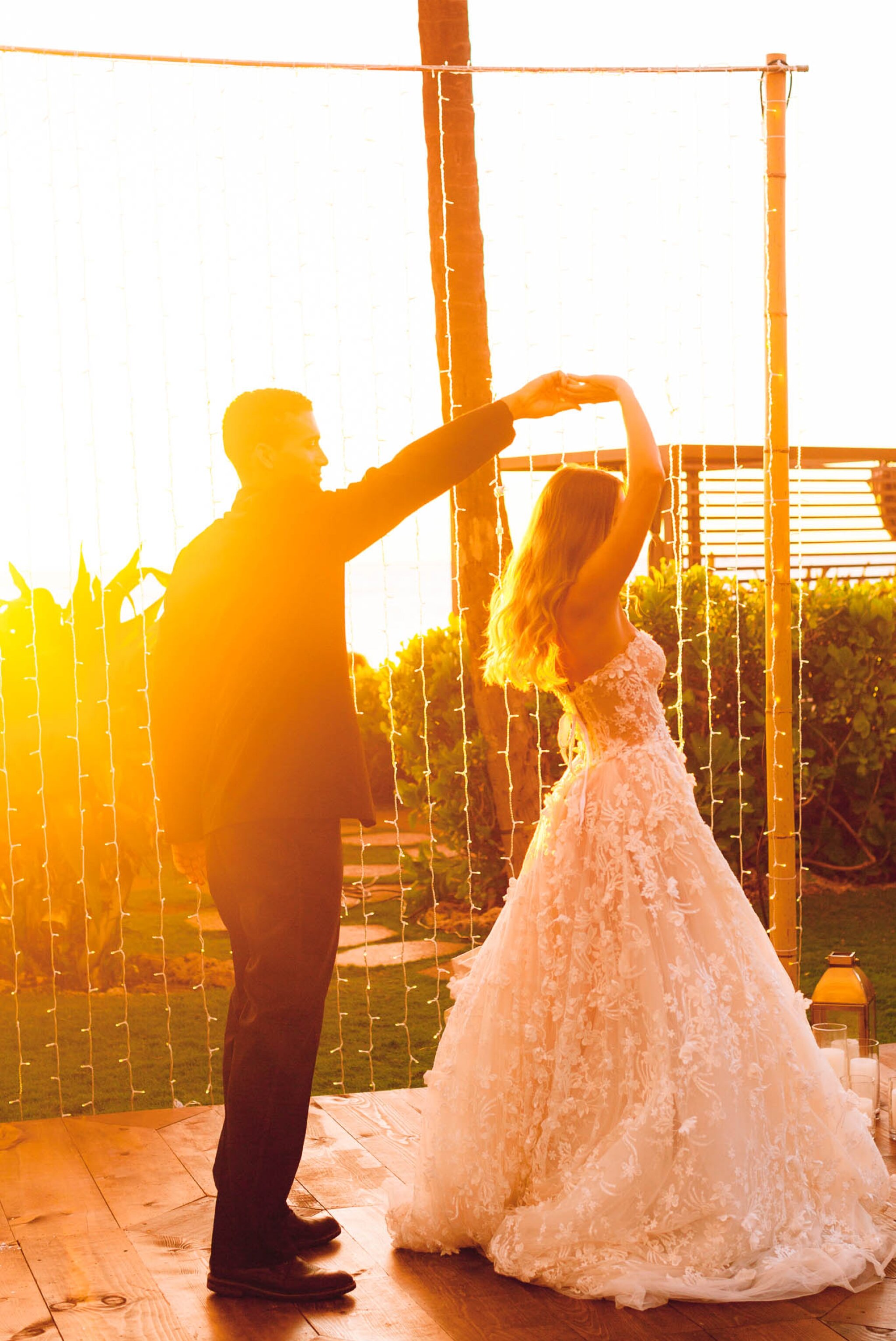 Bride and Groom dancing in the sunset - Four Seasons Oahu at Ko Olina Wedding Inspiration - Kapolei, Hawaii Photographer