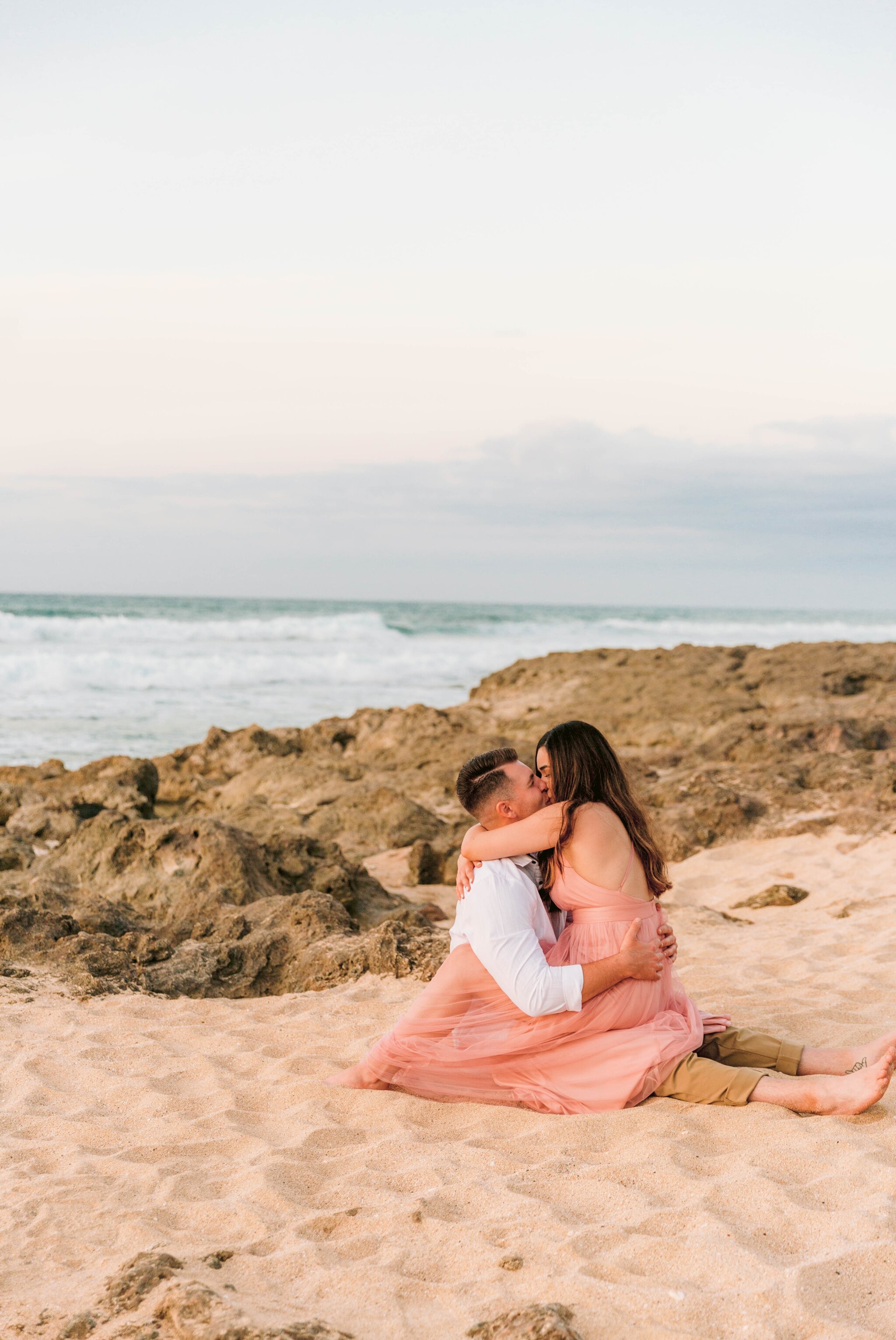 Romantic Beach Engagement Photography Session at Kaena Point - Oahu Hawaii Photographer