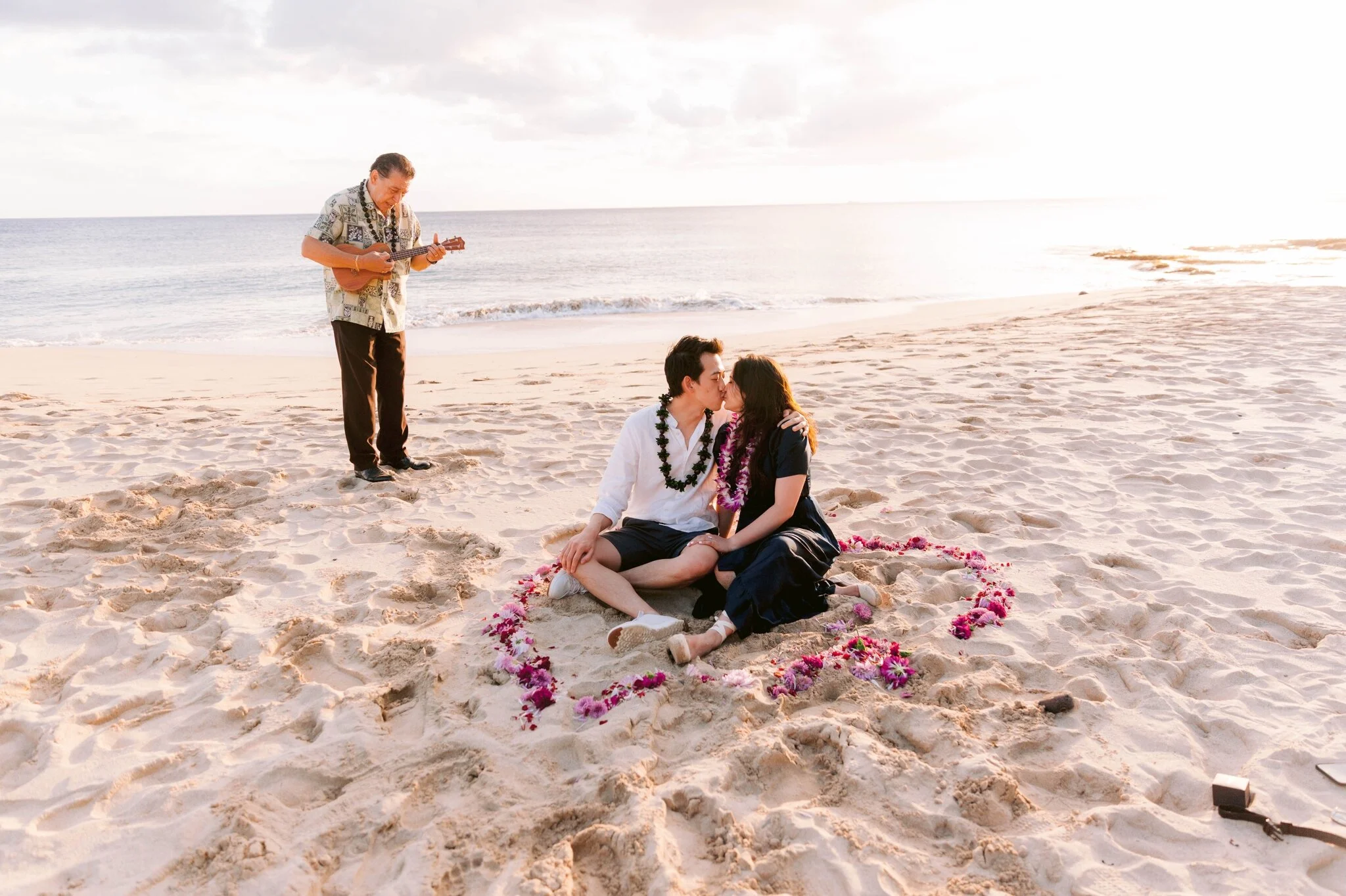 Sunset Proposal at Makua Beach with Ukulele Player - Oahu Engagement Photographer 