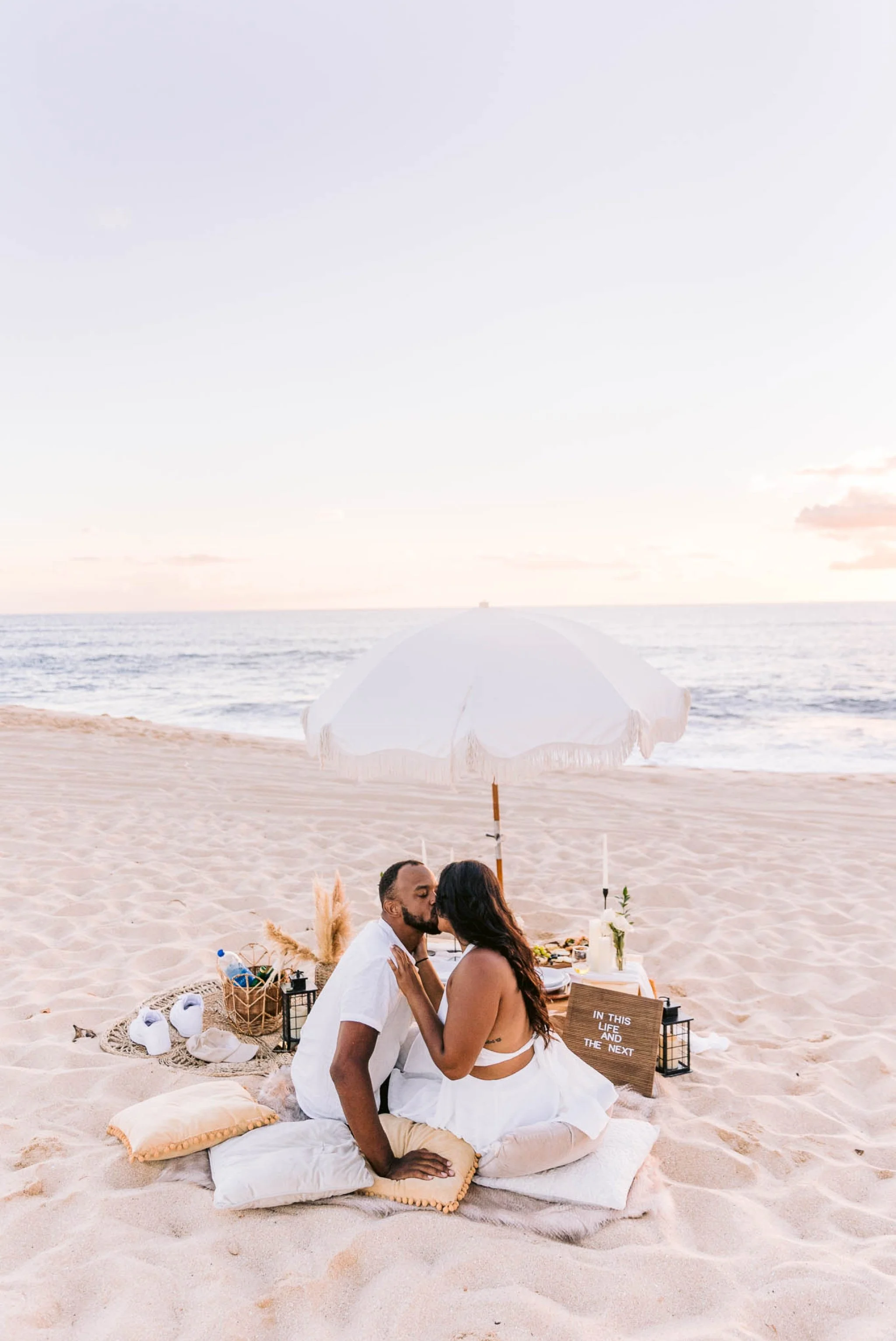 Romantic Oahu Date Night Idea - Sunset Picnic at the Beach - Honolulu Engagement Photographer
