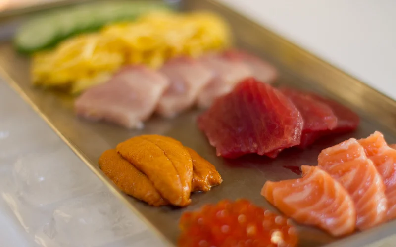 Toppings: uni, maguro, ikura, salmon, hamachi, egg, cucumbers, shiso