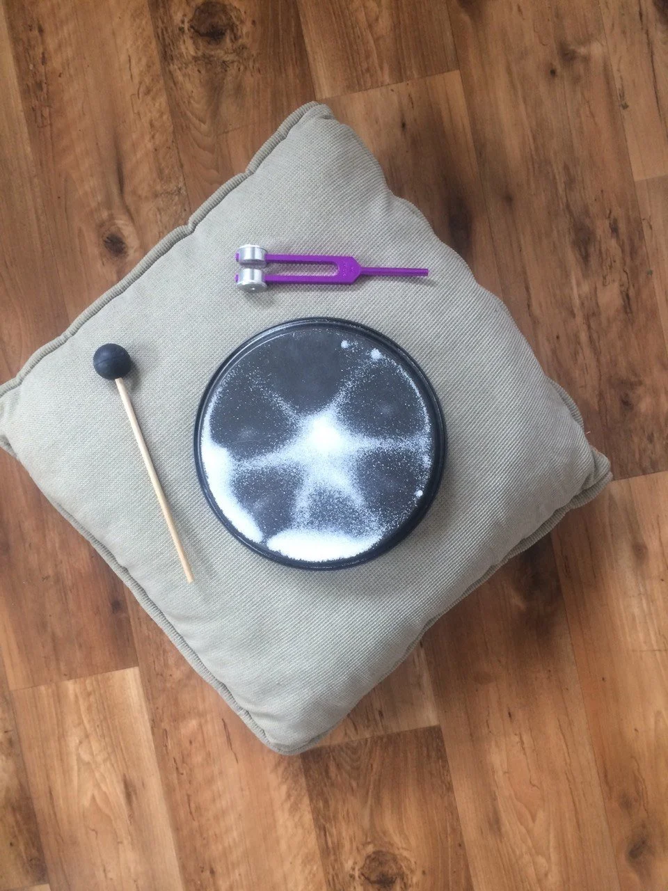 Cymatics pattern, tuning fork.