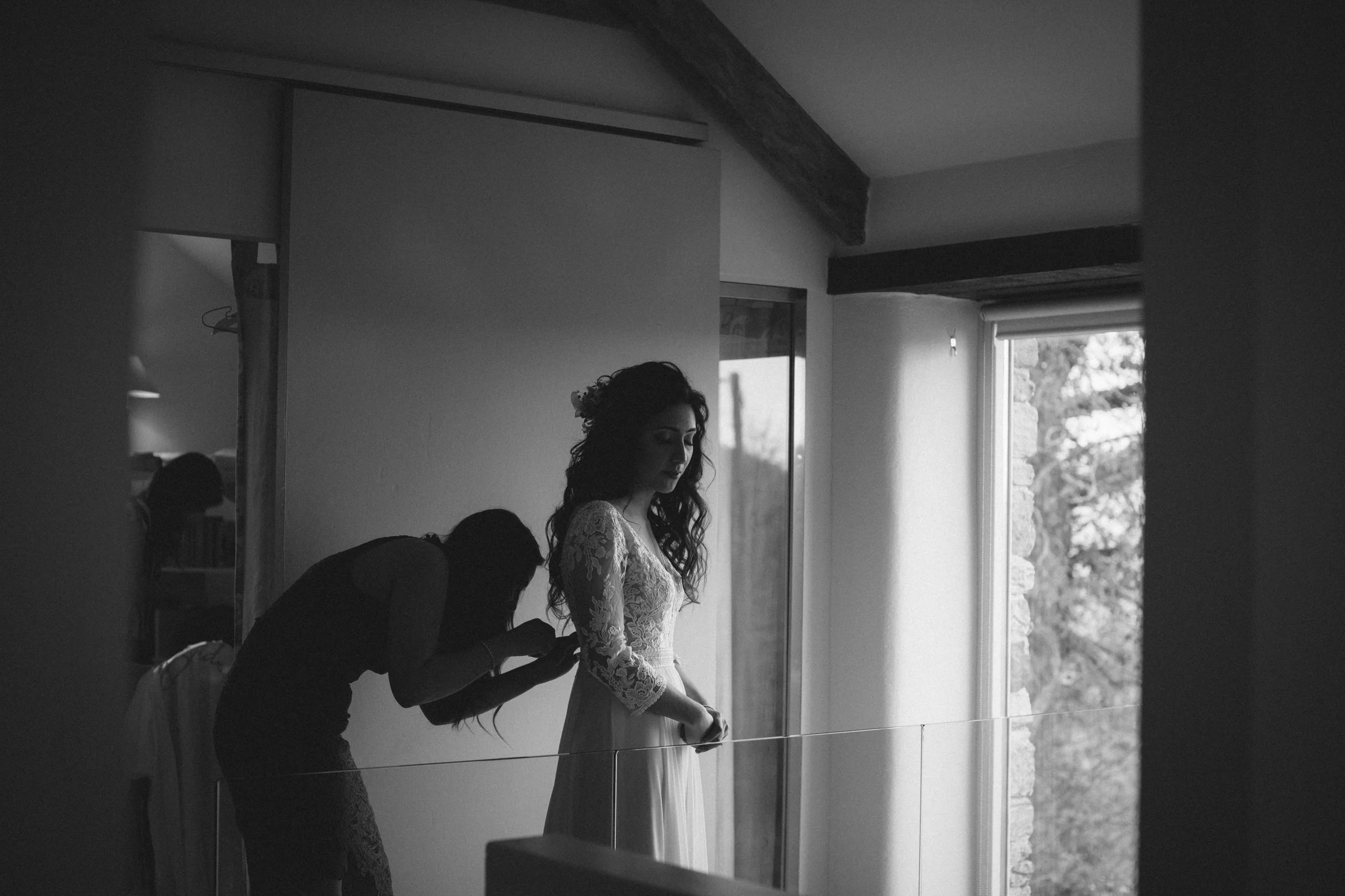 Alternative wedding photography of bride getting ready for her intimate wedding